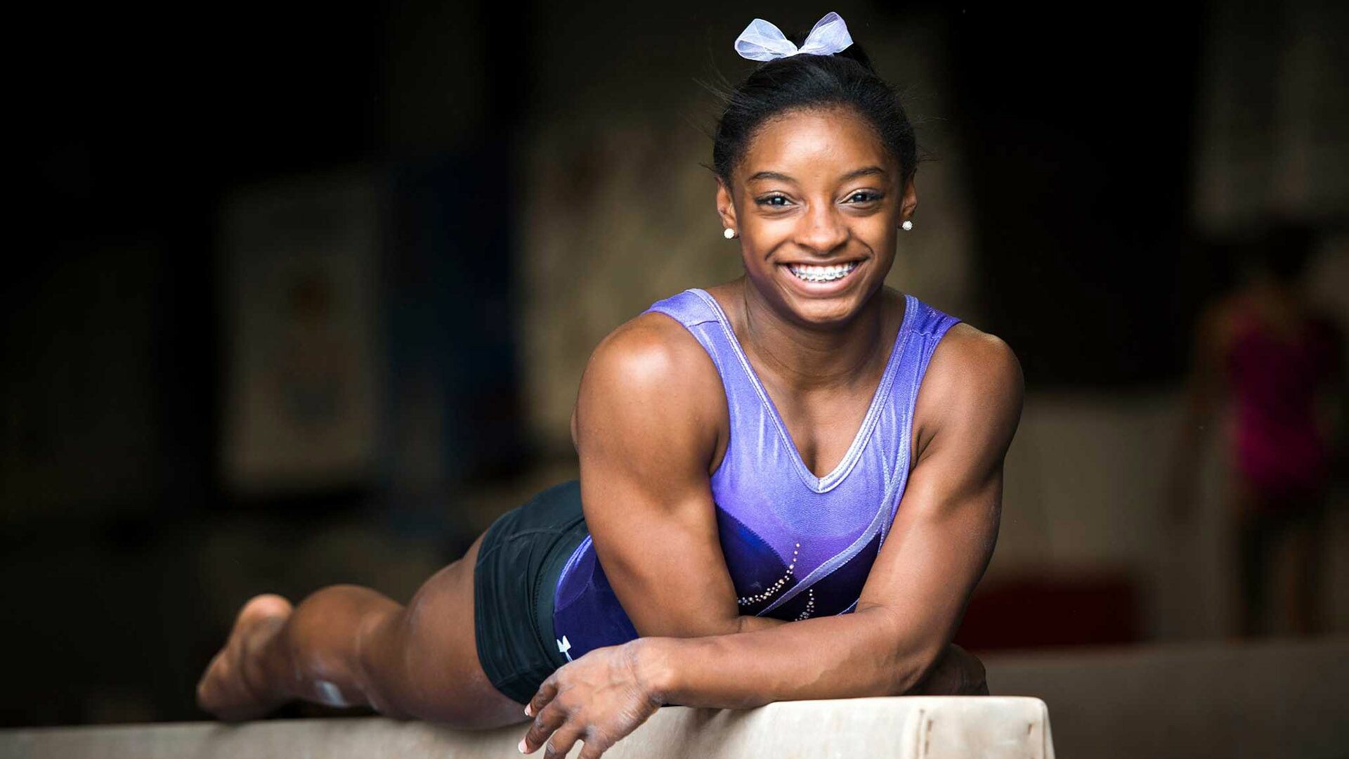 Simone Biles: She set an American record for most gold medals in women's gymnastics at a single Games in 2016. 1920x1080 Full HD Background.