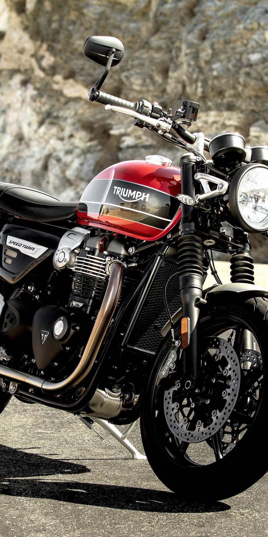 Triumph Motorcycles: Well-known British motorcycle manufacturer, Motor vehicle. 1080x2160 HD Wallpaper.