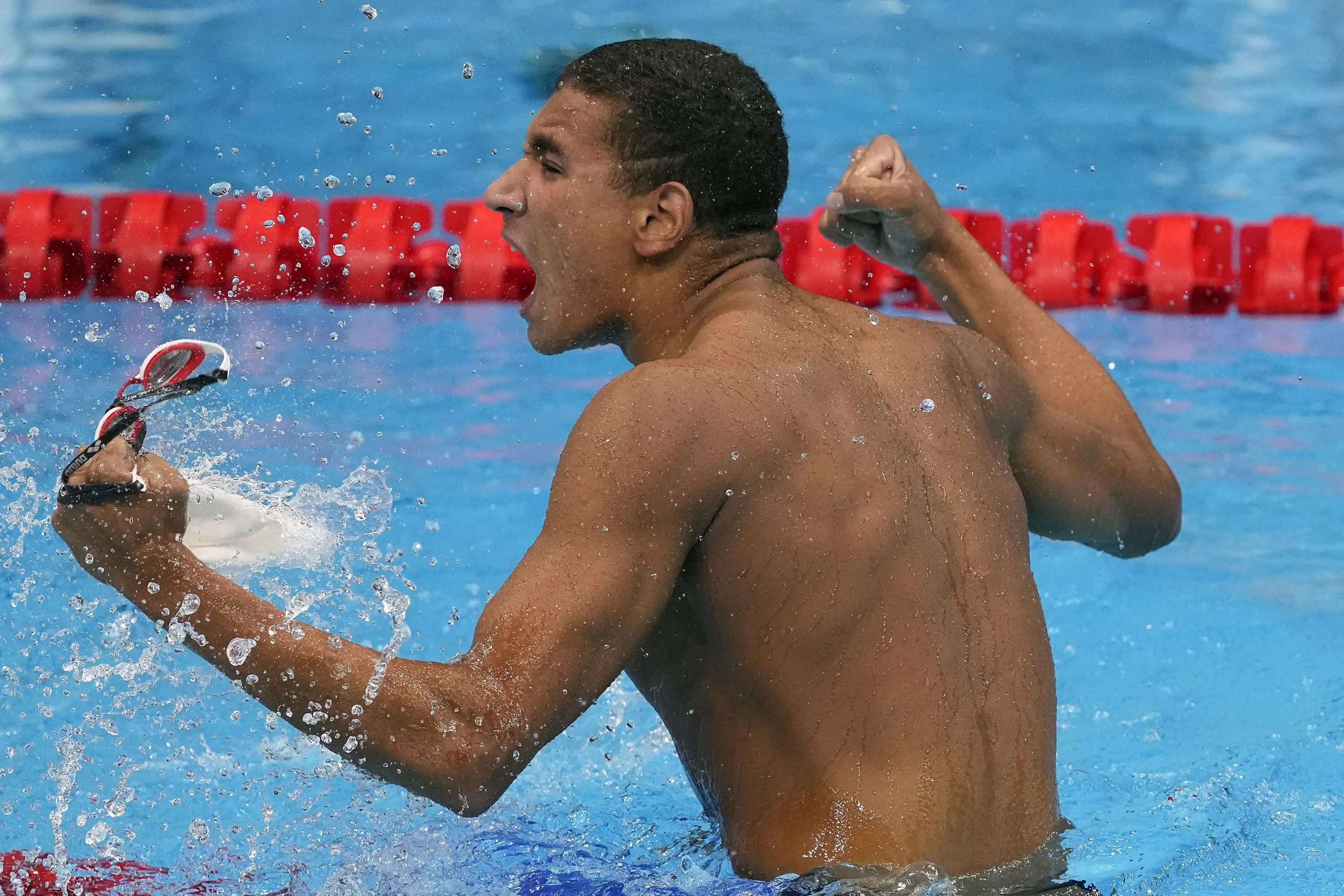 Swimming: Ahmed Hafnaoui, A Tunisian swimmer, Tokyo 2020 men's 400-meter freestyle event champion. 3000x2000 HD Background.