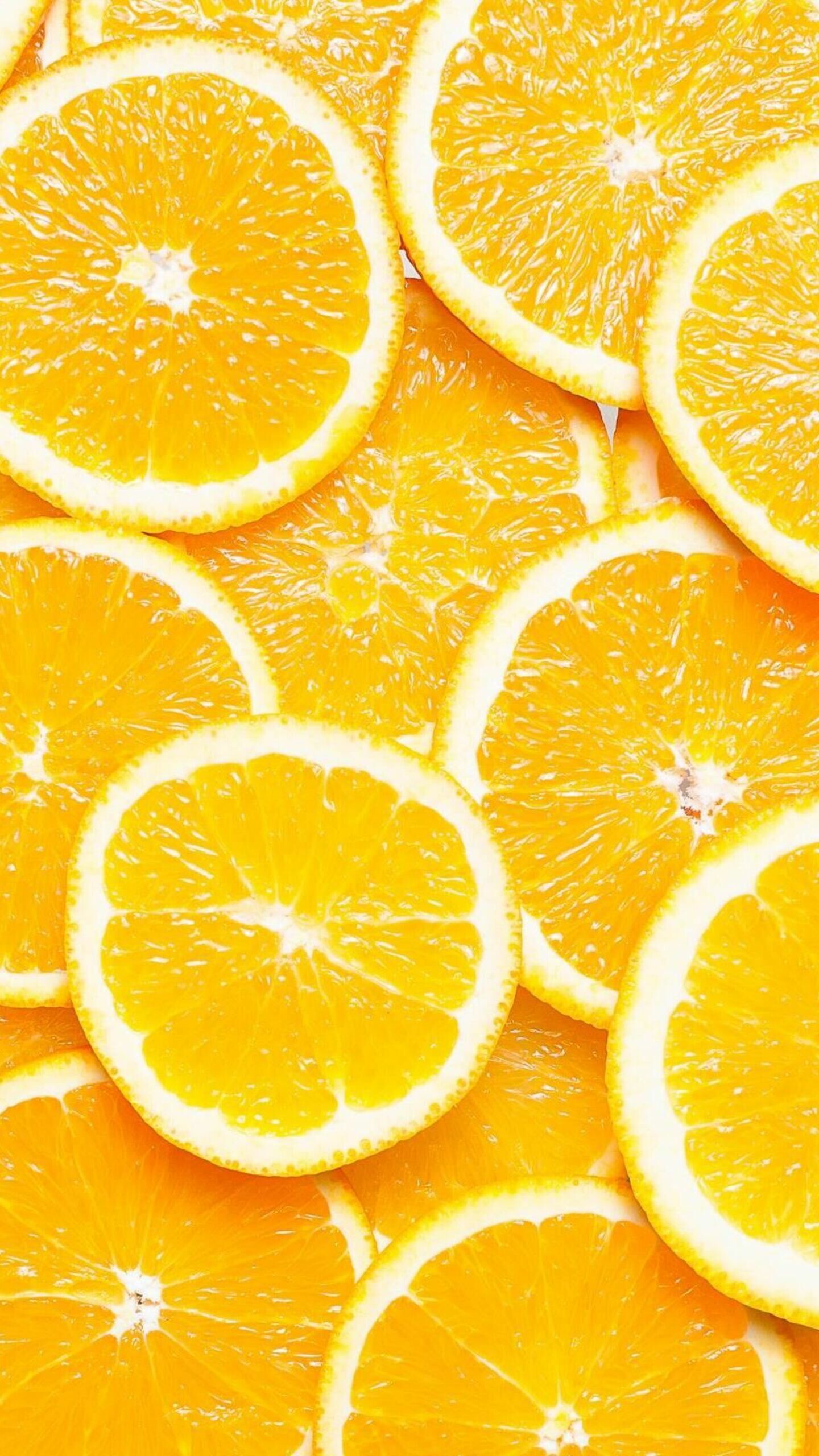 Fruit: Oranges, Flesh is divided into segments called carpels. 1440x2560 HD Wallpaper.