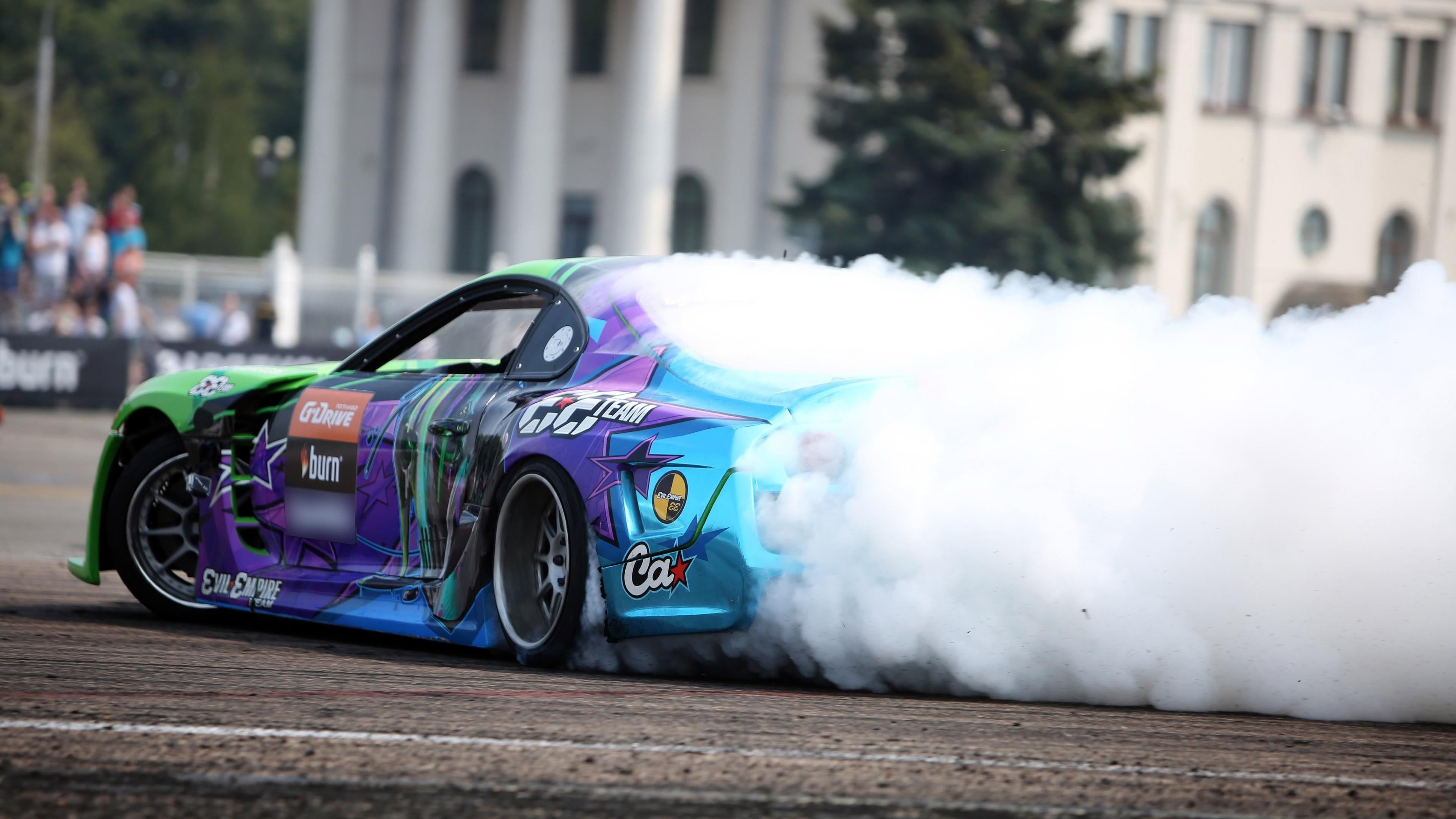 Drifting: Vehicle vinyl wrap, Burning Wheels event, Smoking tires, Professional driving techniques. 3840x2160 4K Background.