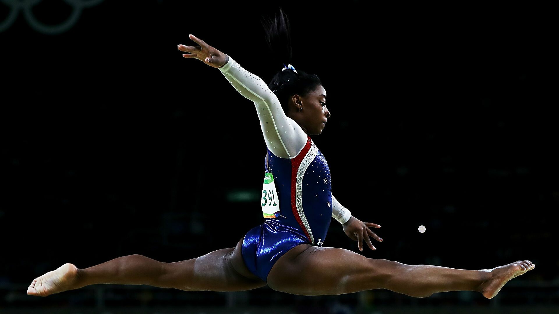 Simone Biles: The fourth female gymnast to win every major all-around title in an Olympic cycle. 1920x1080 Full HD Wallpaper.
