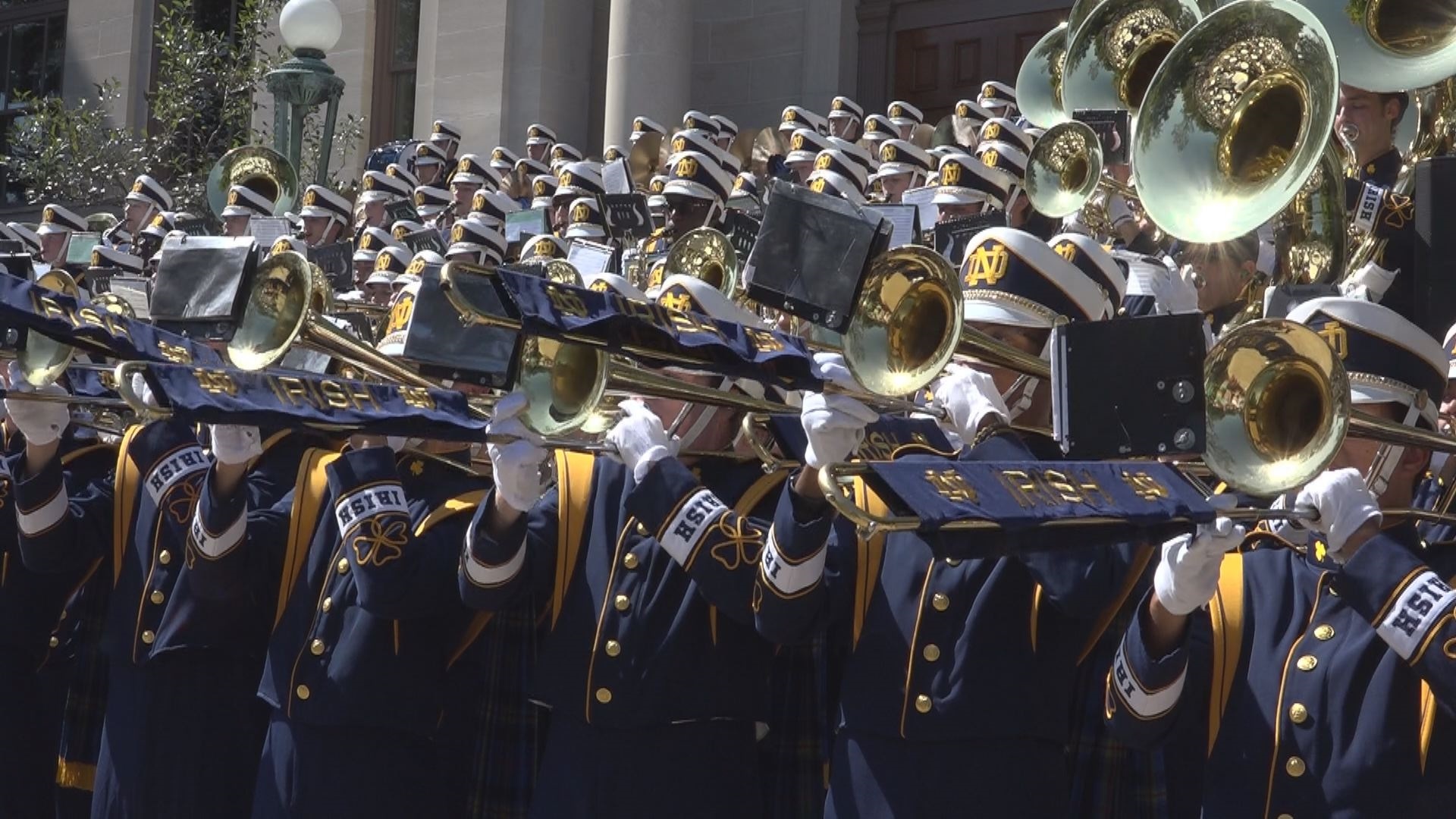 Marching Band: Notre Dame, Fighting Irish, An orchestra that march at the same time as playing the instruments, Musical ensemble. 1920x1080 Full HD Background.