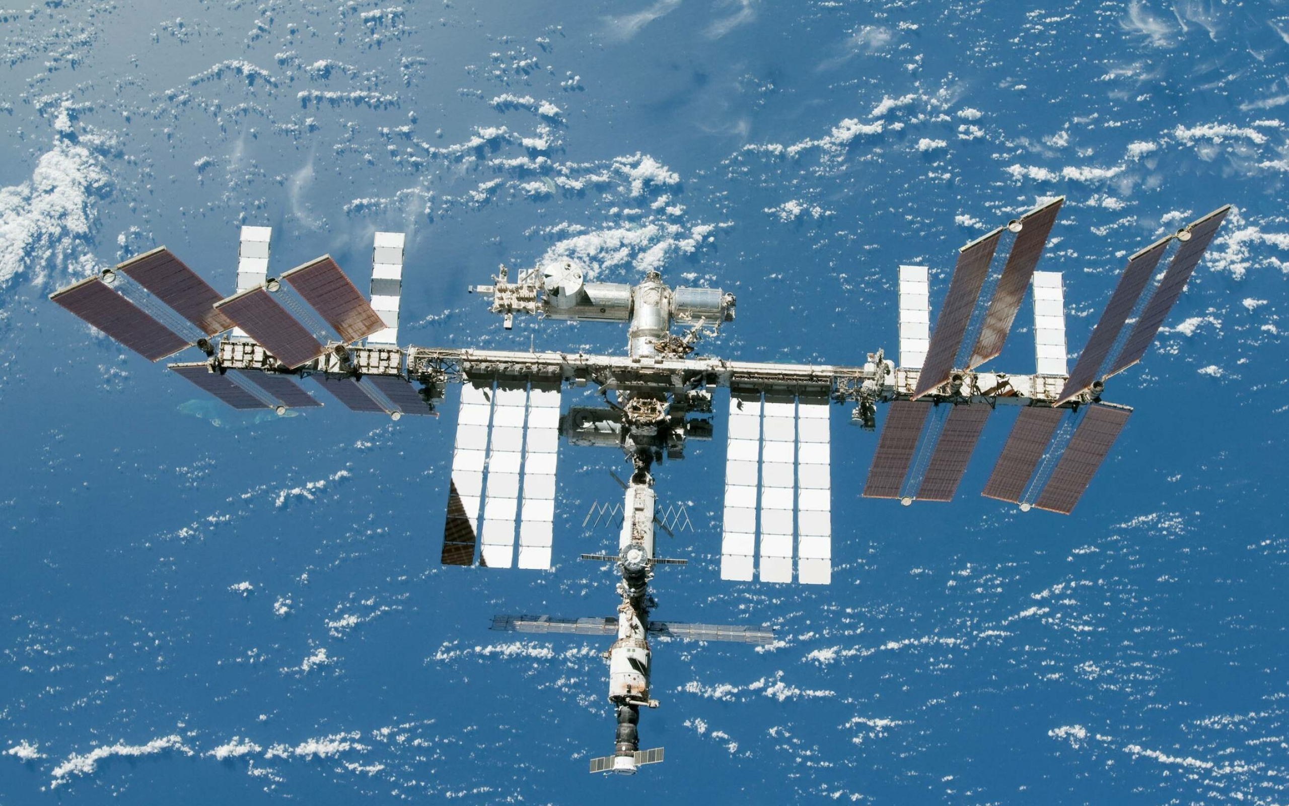 Space Station: The ISS, Consists of pressurised habitation modules, Earth. 2560x1600 HD Background.