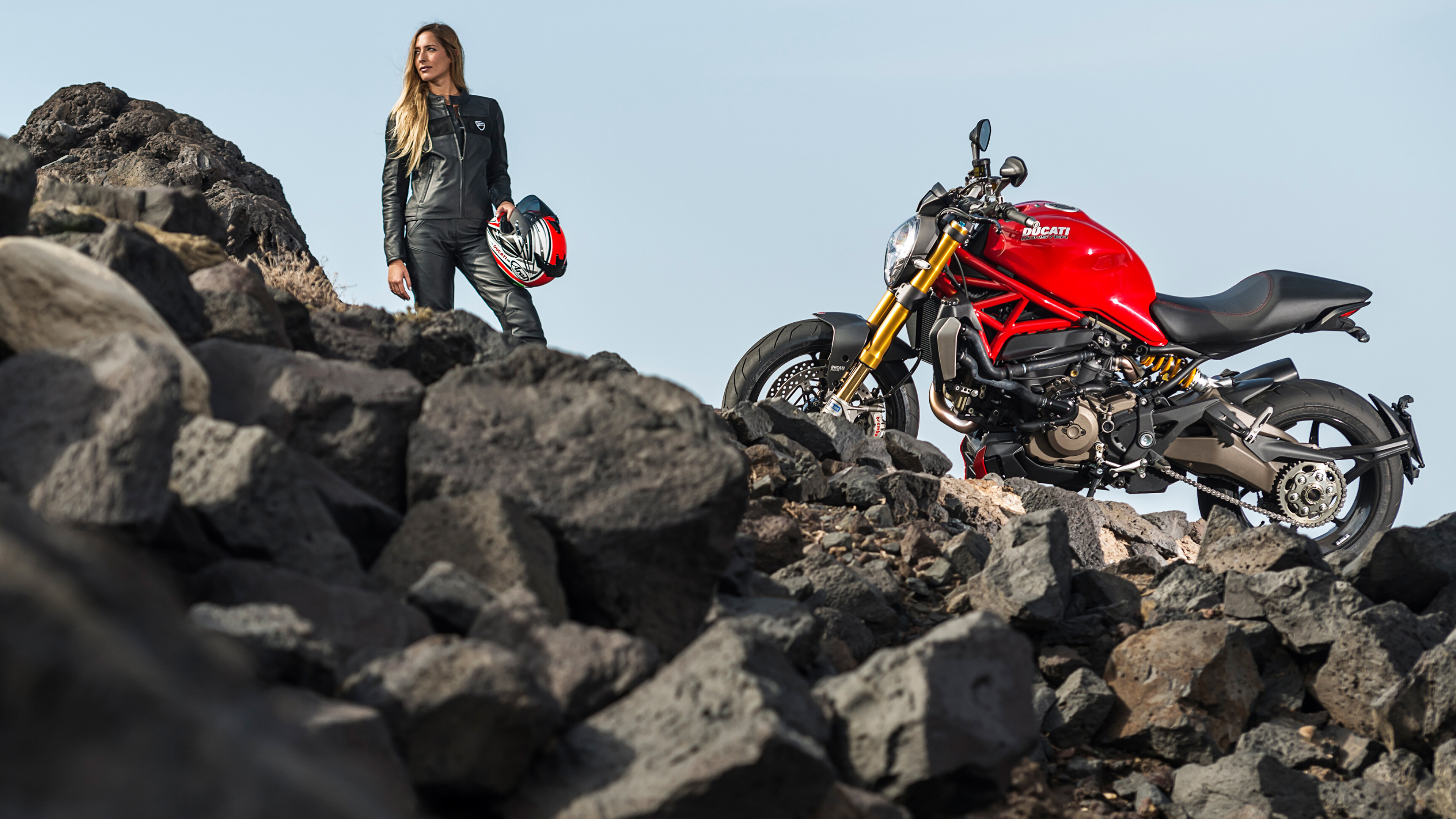 Girls and Motorcycles: The Ducati Monster, A motorbike designed by Miguel Angel Galluzzi and produced by Ducati in Bologna, Italy. 3840x2160 4K Background.