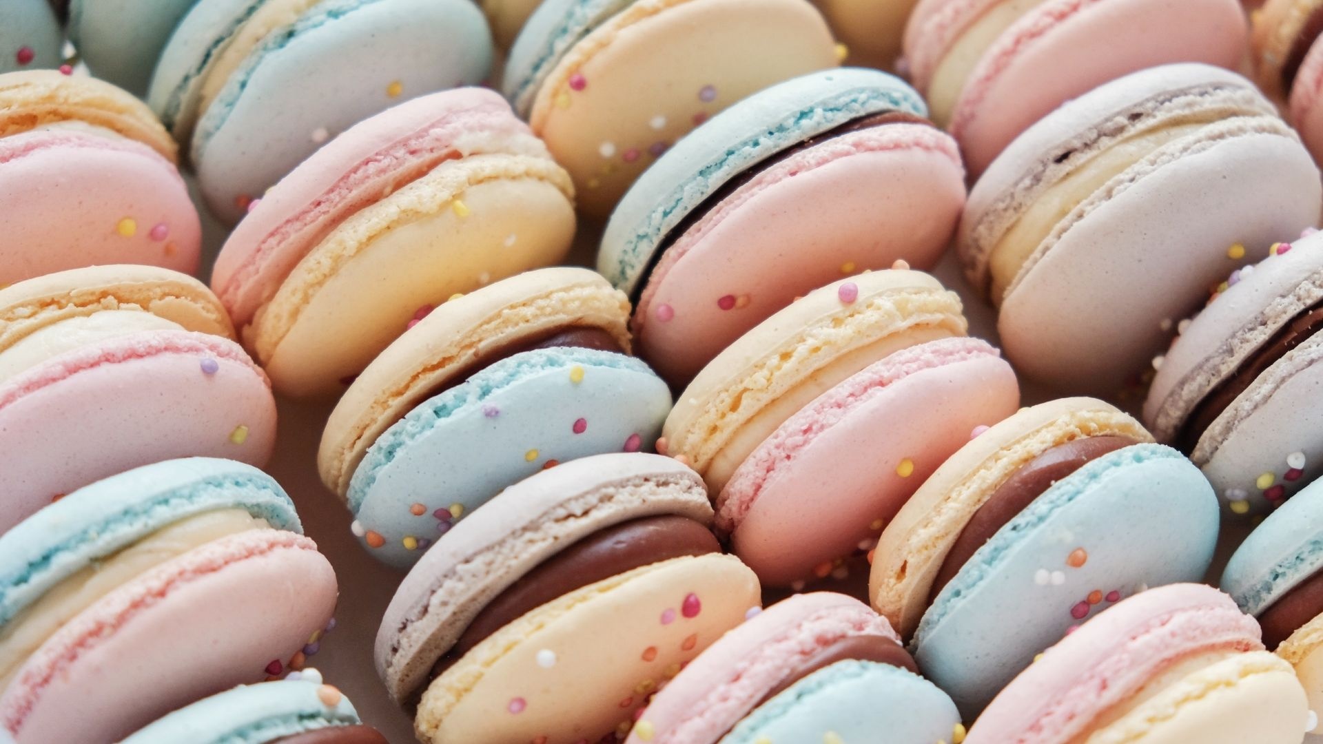 Macaron: Colorful sweet biscuits, French cuisine. 1920x1080 Full HD Background.