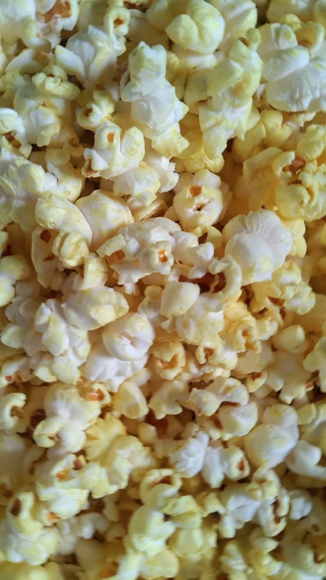 Close-up popcorn video, Stock footage, Popcorn popping, Visual treat, 1080x1920 Full HD Phone