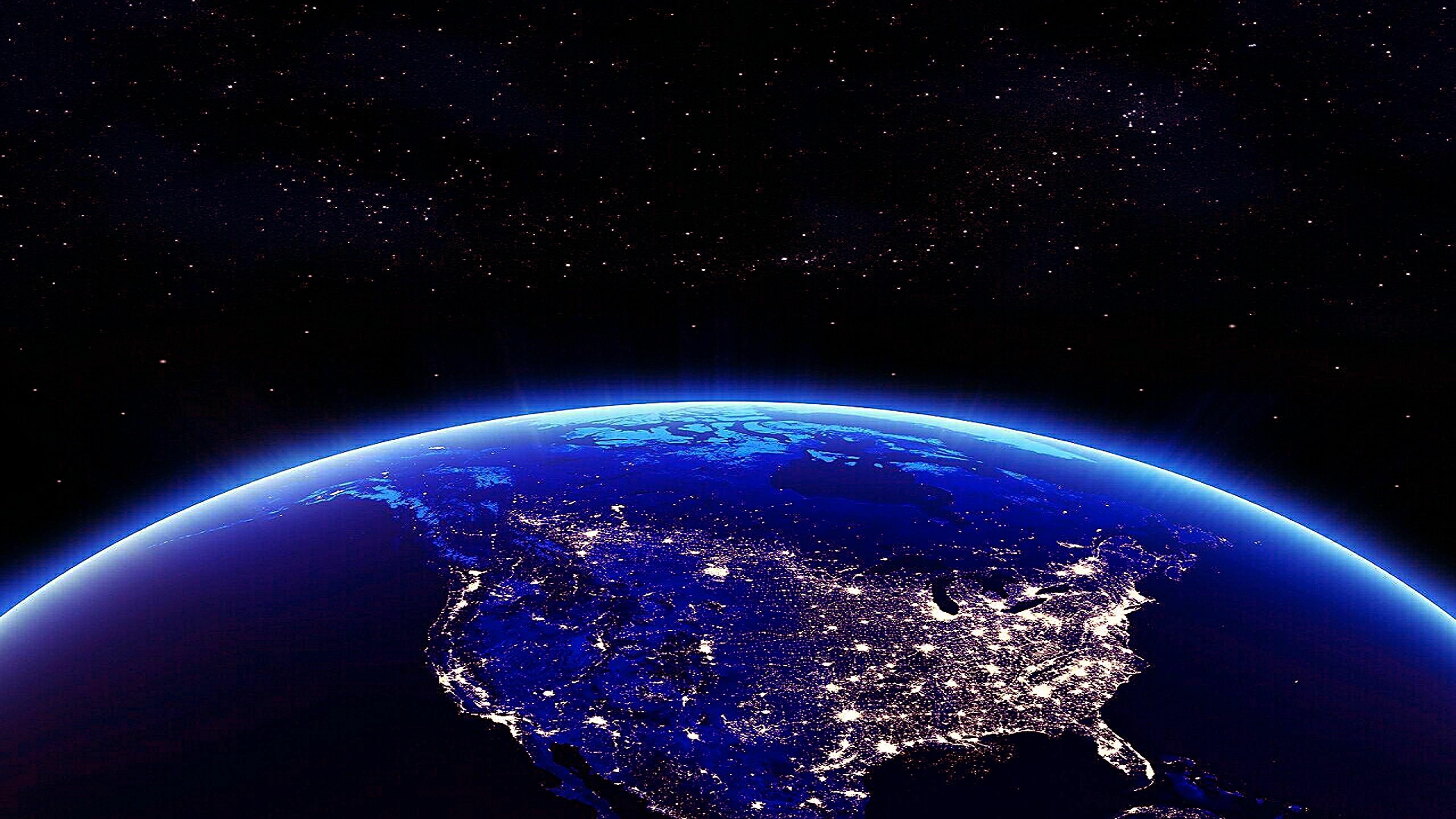 Earth at Night: By the darkness, stars are revealed, The view of the USA from space. 3840x2160 4K Background.