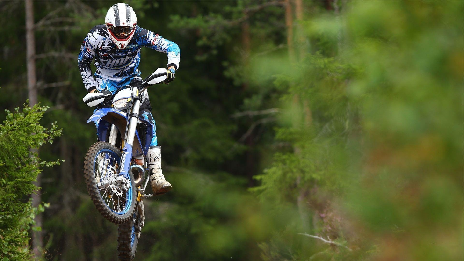 Stunt: Motocross in the forest, Off-road stunting motorcycle sport. 1920x1080 Full HD Wallpaper.