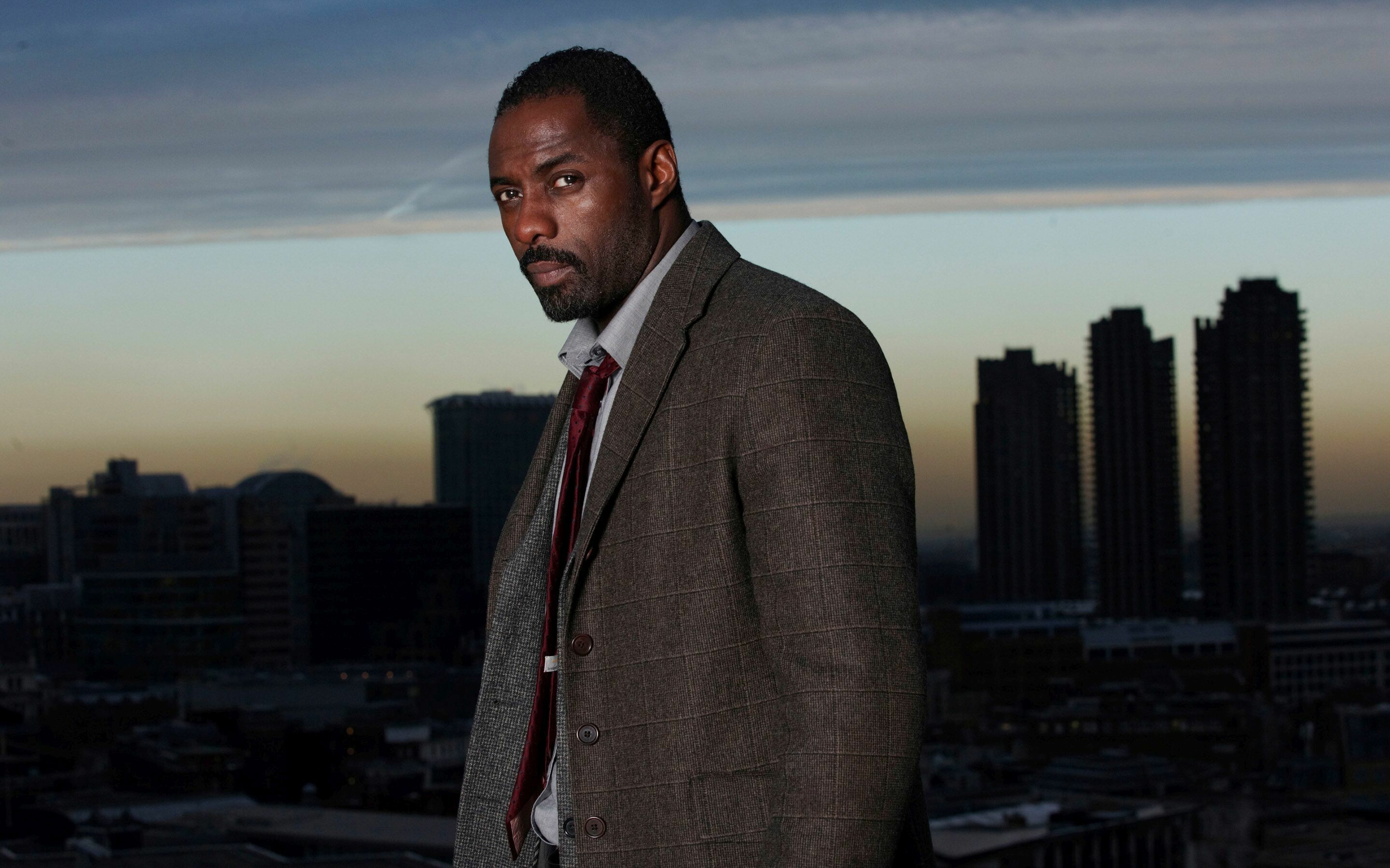 Luther (TV series): Idris Elba as a detective who has a complicated relationship with the murderer Morgan. 2880x1800 HD Background.