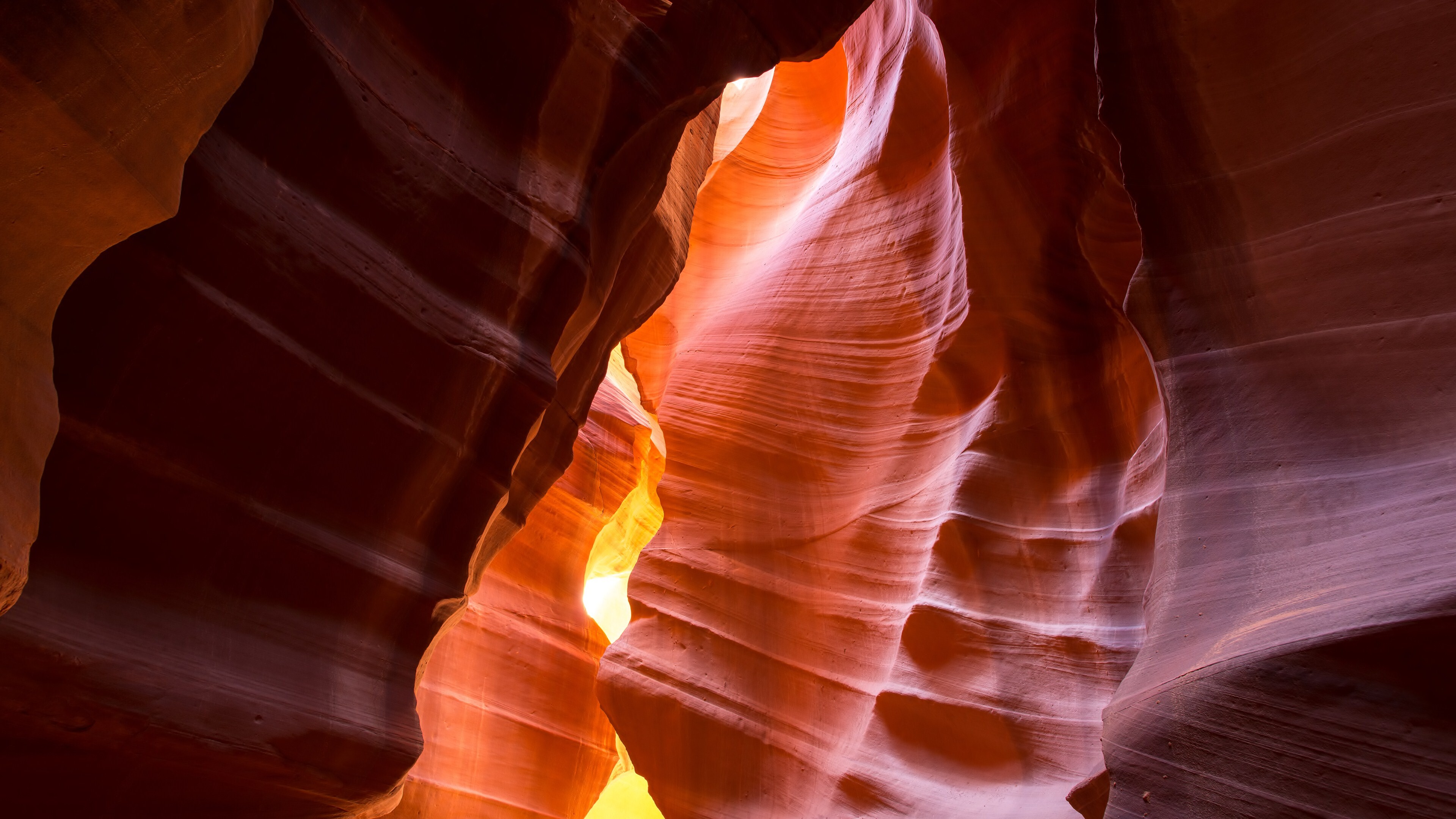 Geology: Slot canyon, A long, narrow channel or drainageway with sheer rock walls. 3840x2160 4K Background.