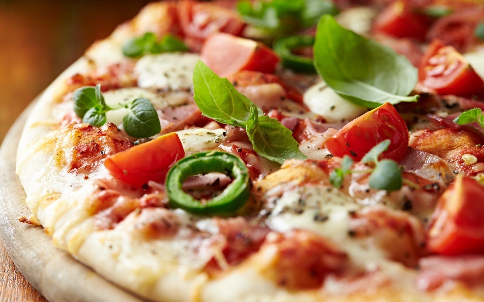 Pizza: A baked disc of dough covered with cheese and tomatoes, Italian cuisine. 1920x1200 HD Background.
