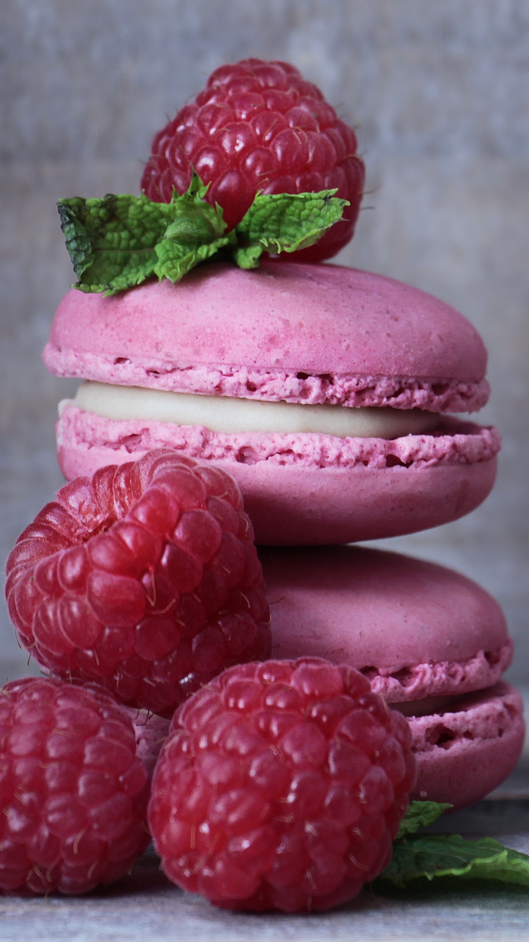 Macaron: A meringue-based sandwich cookie, Raspberries, Mint. 2160x3840 4K Background.
