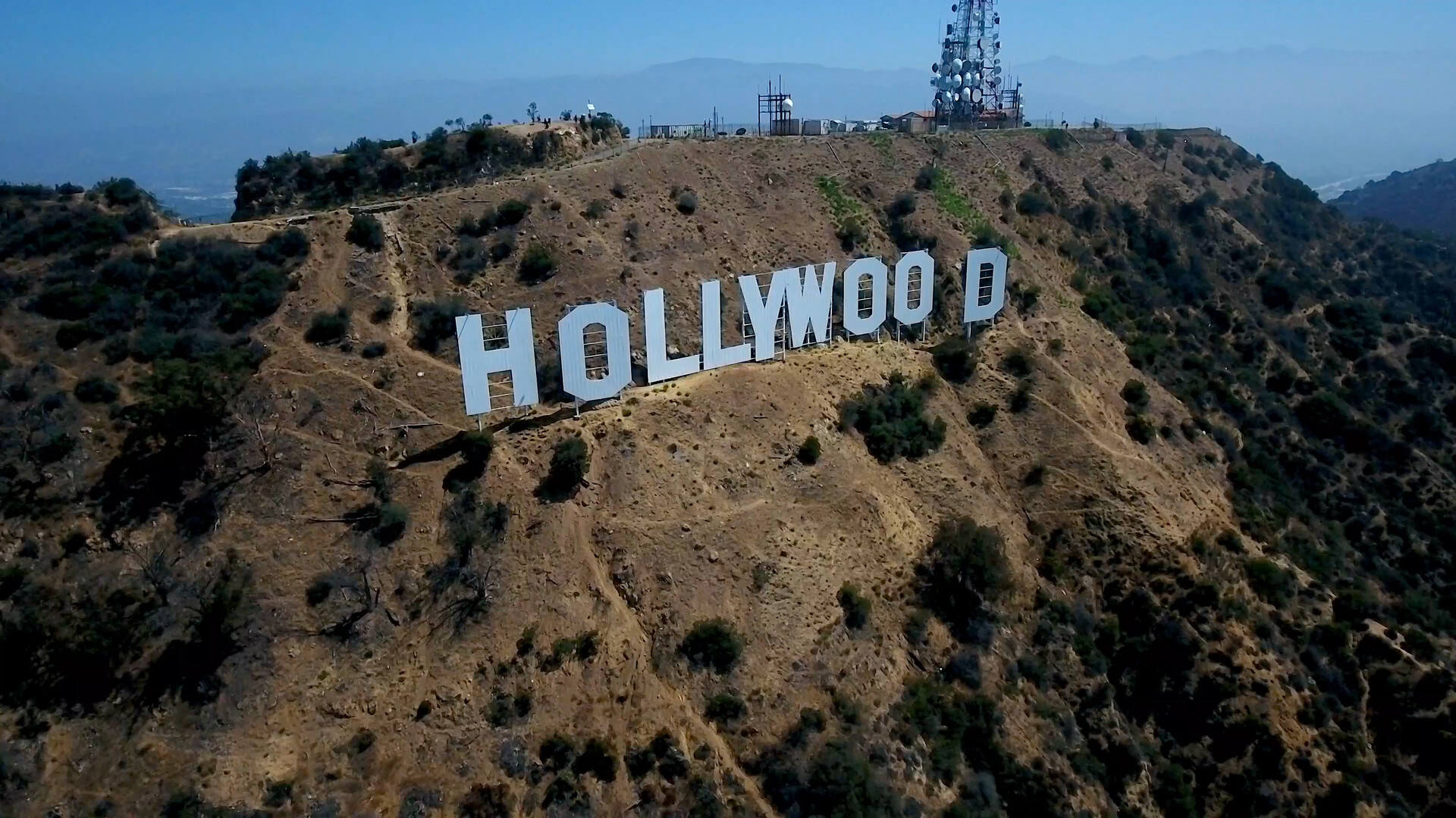 Hollywood Sign: A landmark and American cultural icon located in Los Angeles, California. 1920x1080 Full HD Background.