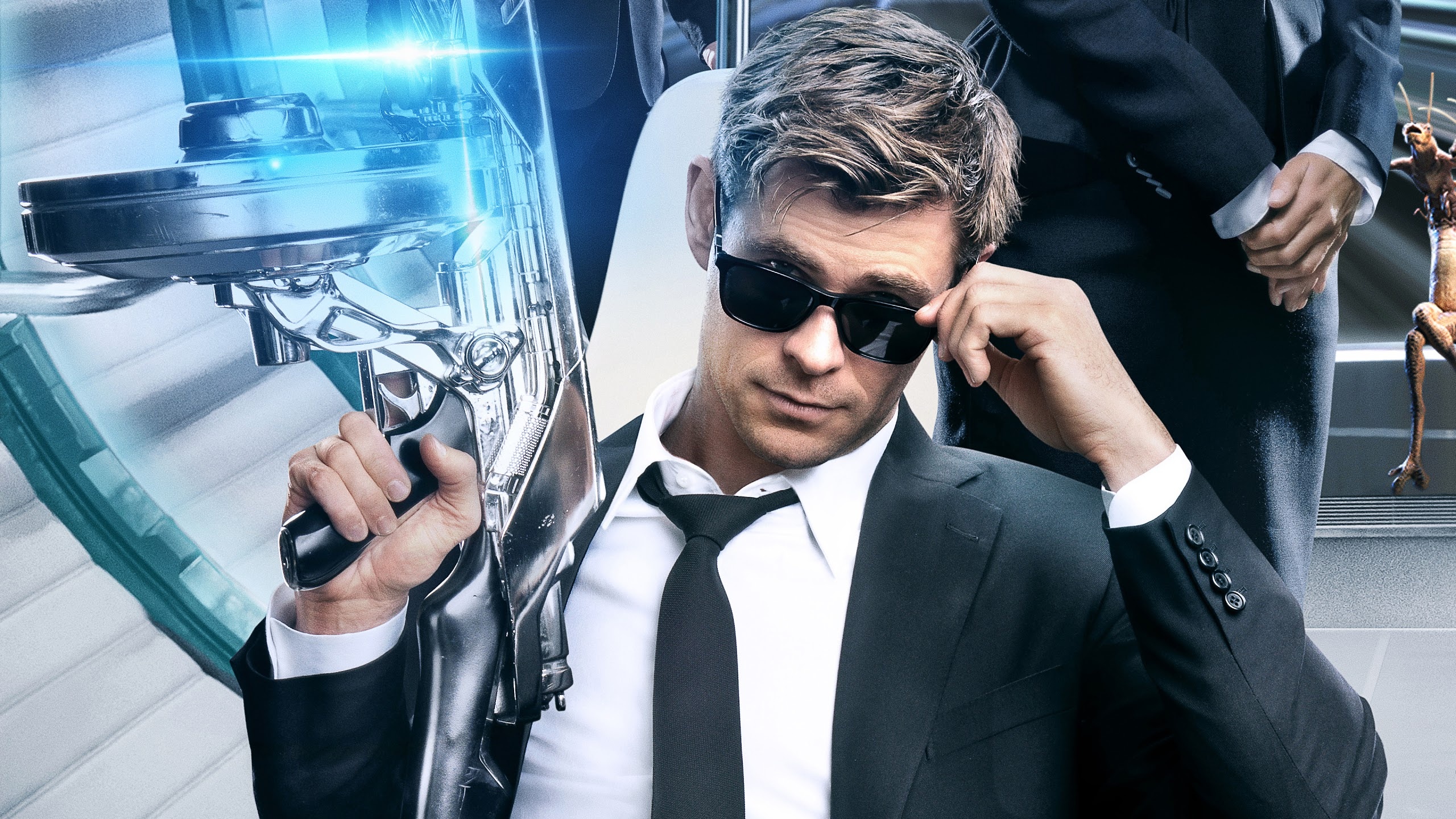 Chris Hemsworth: Men in Black: International, Agent H, a top agent and later probationary head of the MIB UK branch. 2560x1440 HD Wallpaper.