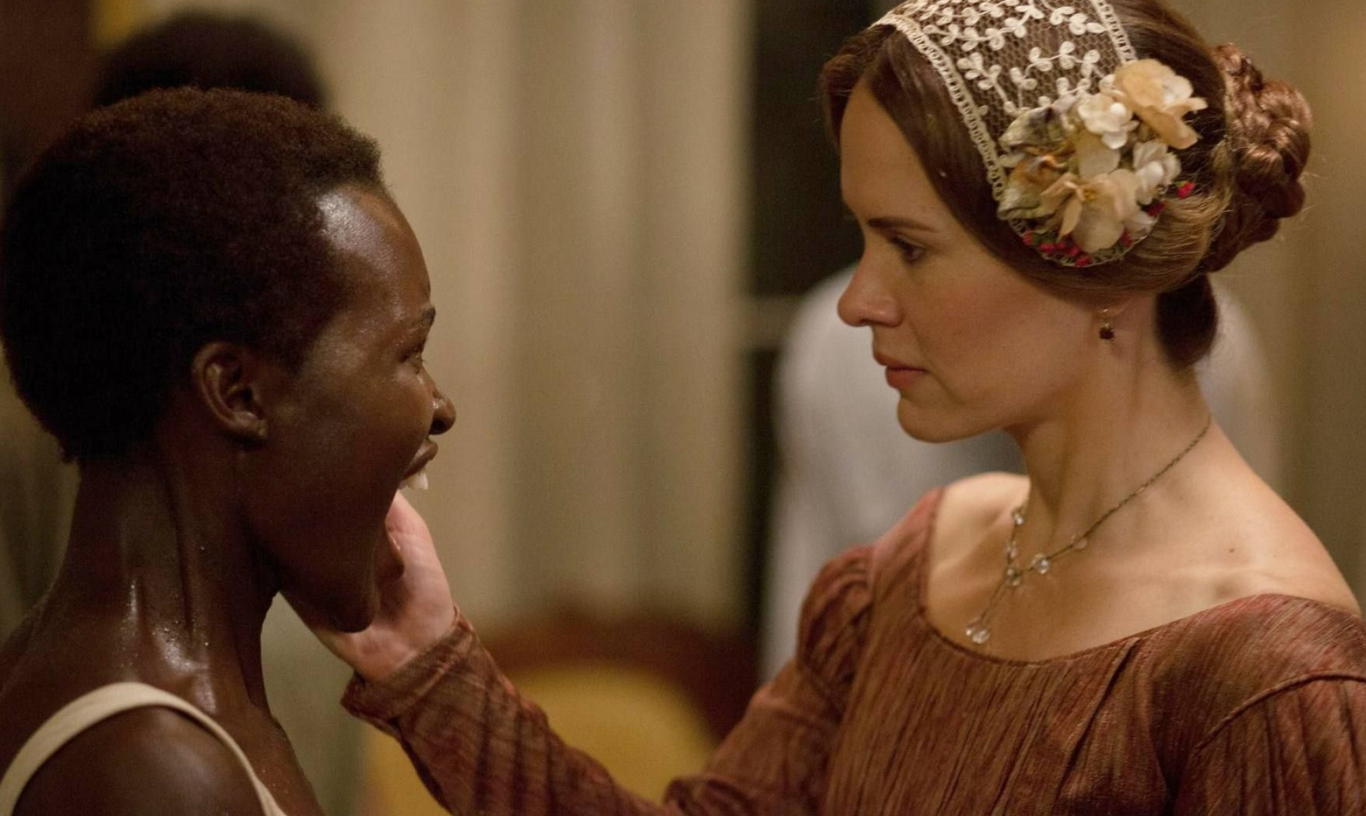 12 Years A Slave: Mary Epps, The secondary antagonist of the 2013 film, Patsey. 1950x1170 HD Background.