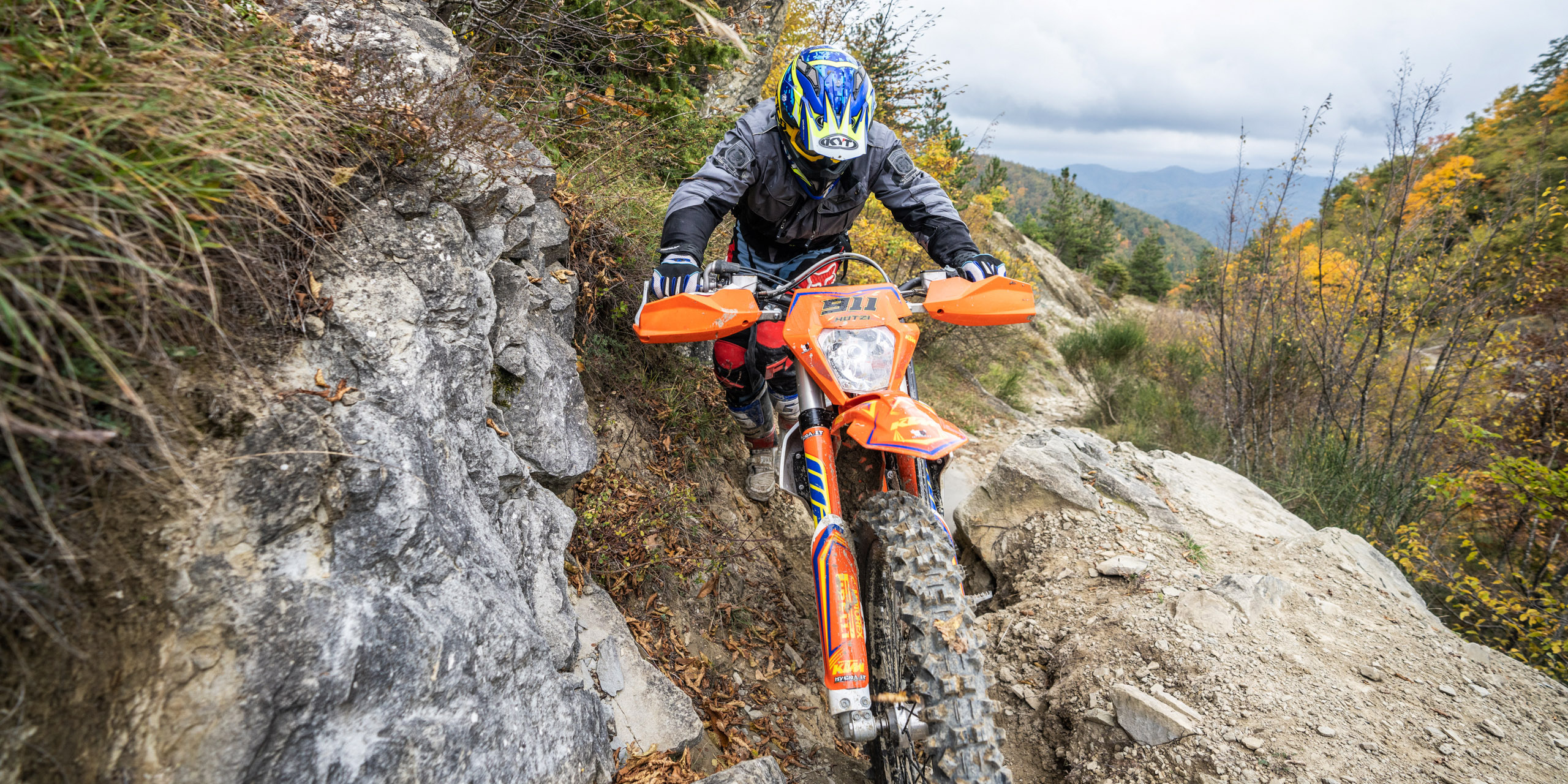 Enduro Motorbike: Extreme Riding On The Mountain Serpentine, KTM 690 Enduro R. 2560x1280 Dual Screen Wallpaper.