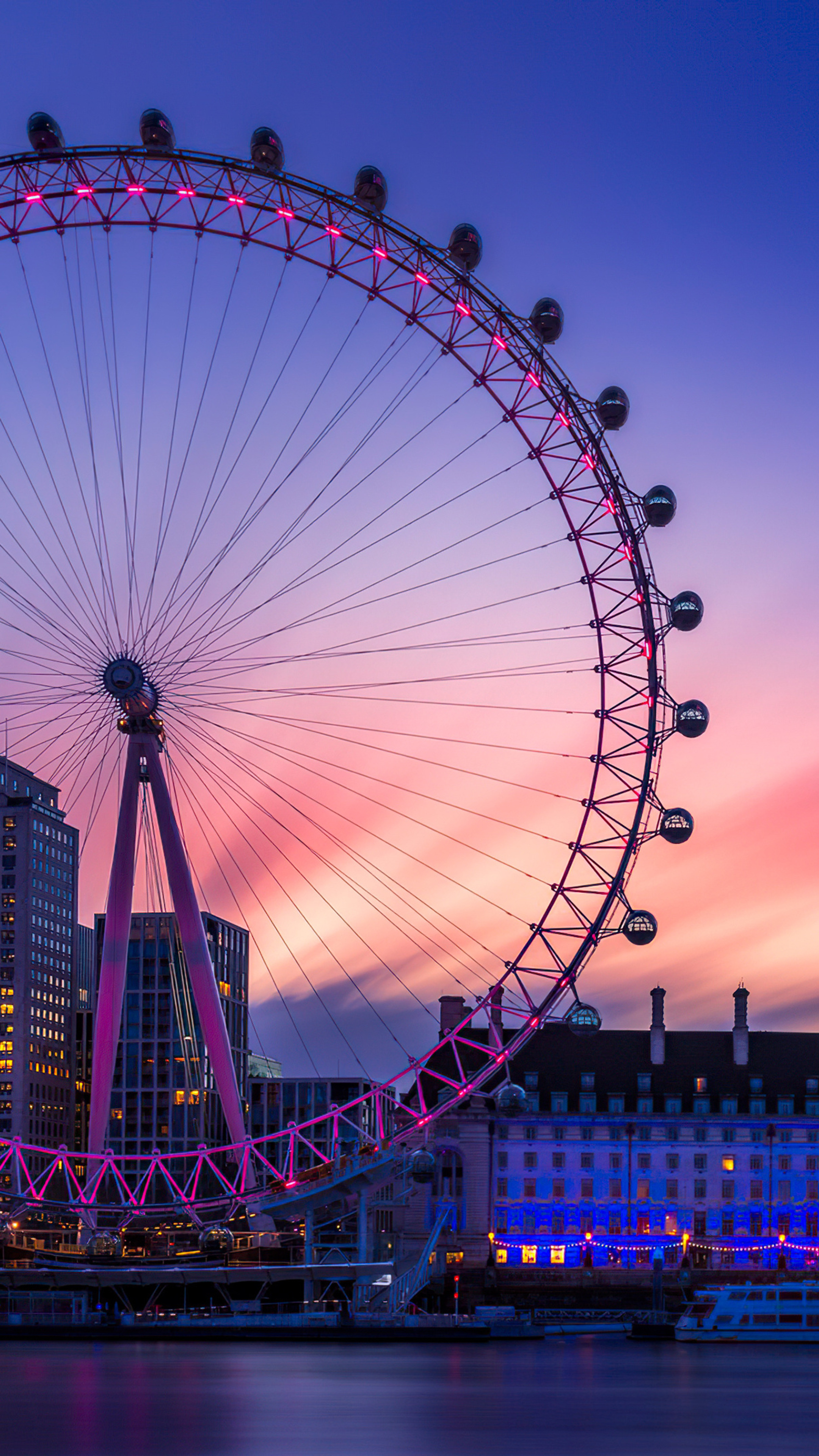 London: The London Eye, A cantilevered observation wheel on the South Bank of the River Thames. 2160x3840 4K Background.