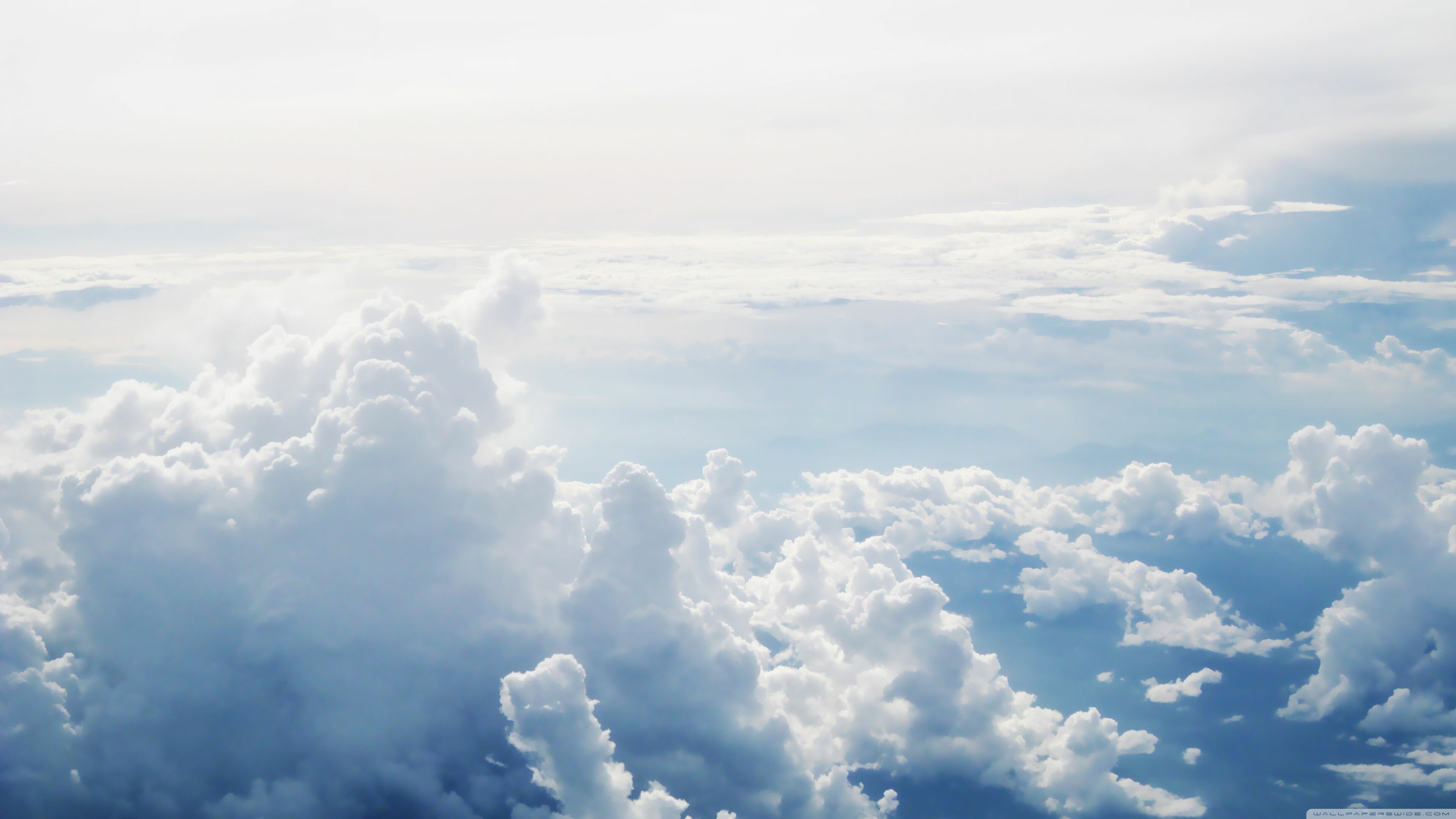 Clouds: An aerosol suspended in the atmosphere of a planetary body. 3840x2160 4K Wallpaper.