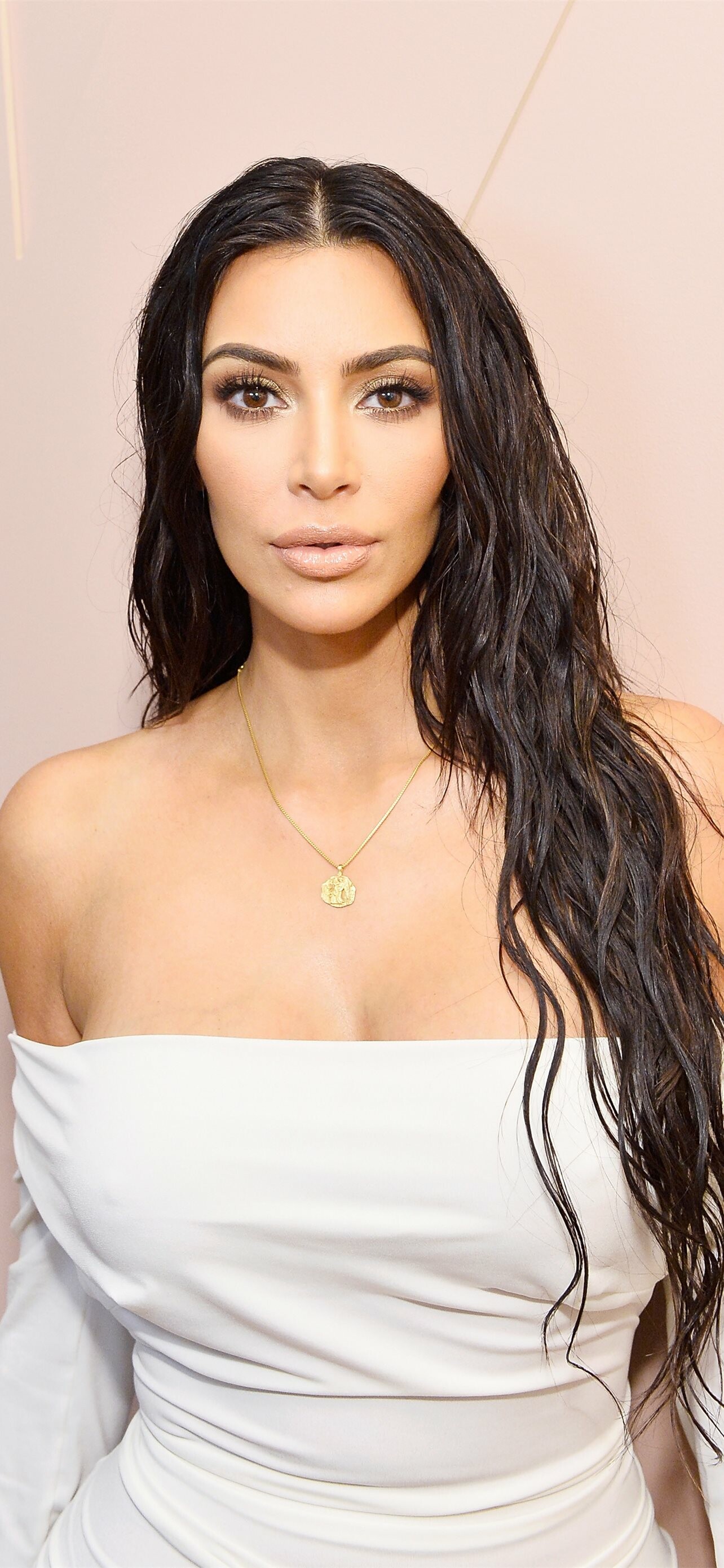 Kim Kardashian: Starred in the spin-off series Kourtney and Kim Take New York, 2011–12. 1290x2780 HD Background.