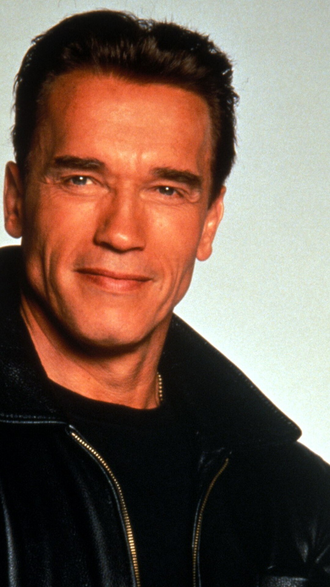 Arnold Schwarzenegger: Was cast U.S. Marshal John Kruger in a 1996 American action film, Eraser. 1080x1920 Full HD Wallpaper.