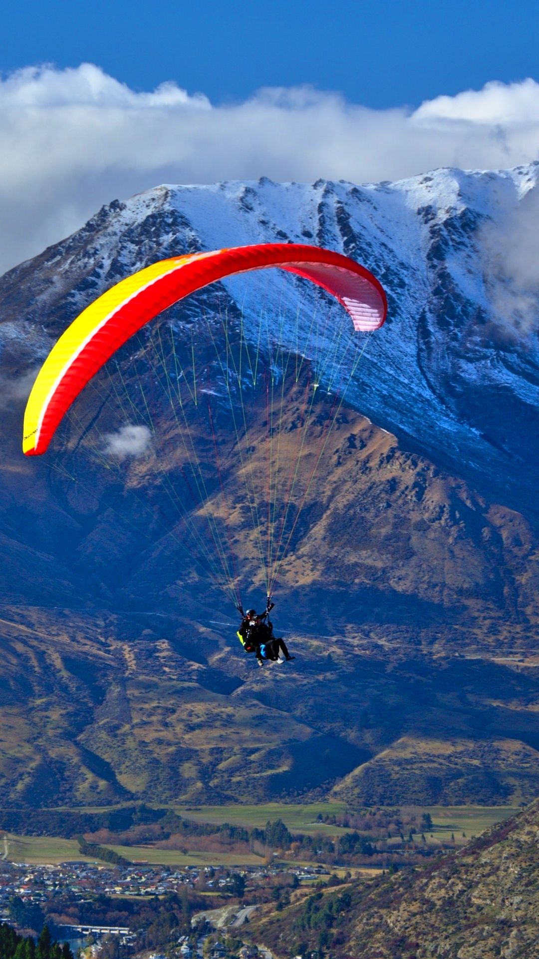 Paragliding: Flying glider aircraft in Switzerland, Swiss Hang Gliding and Paragliding Association. 1080x1920 Full HD Background.