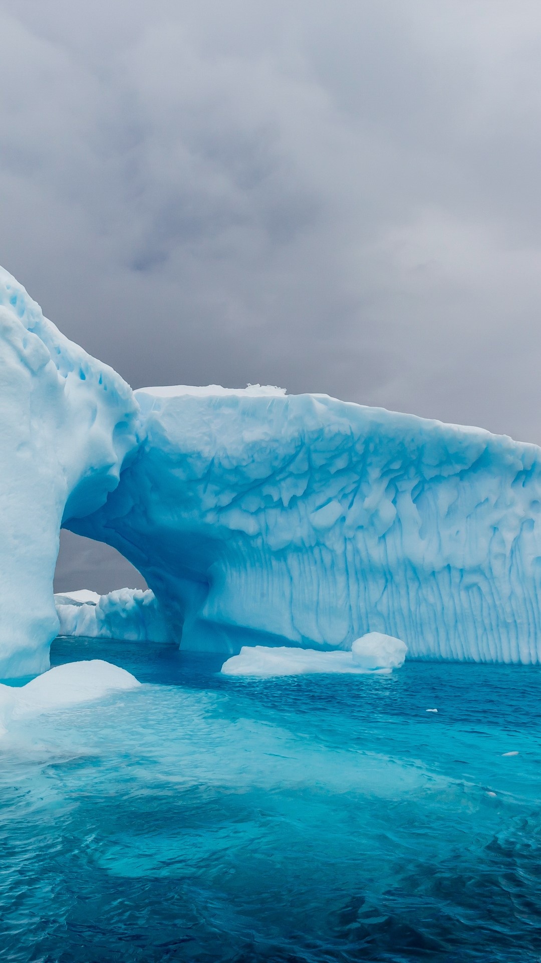 Archway formed, Glacial iceberg, Cierva Cove, Windows 10 spotlight images, 1080x1920 Full HD Phone