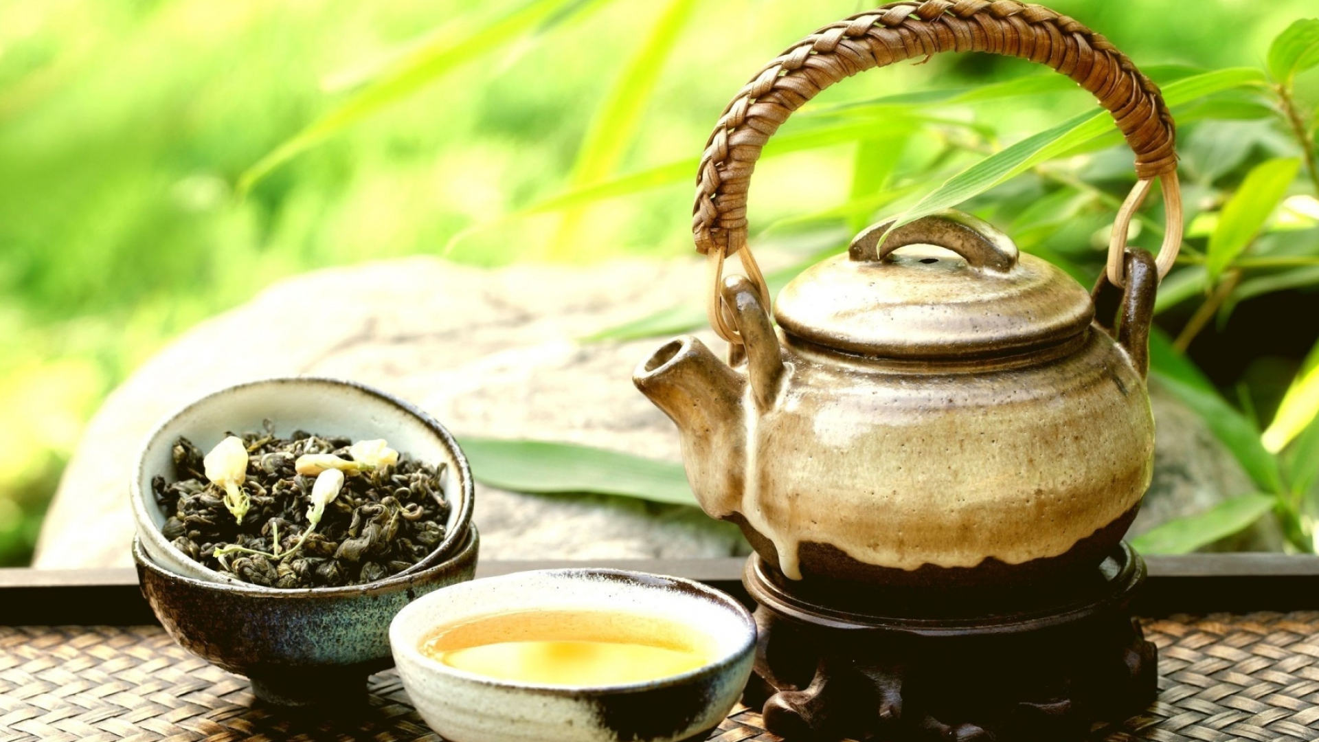 Tea: Oolong, Camellia sinensis plant, Dried leaves and leaf buds. 1920x1080 Full HD Background.