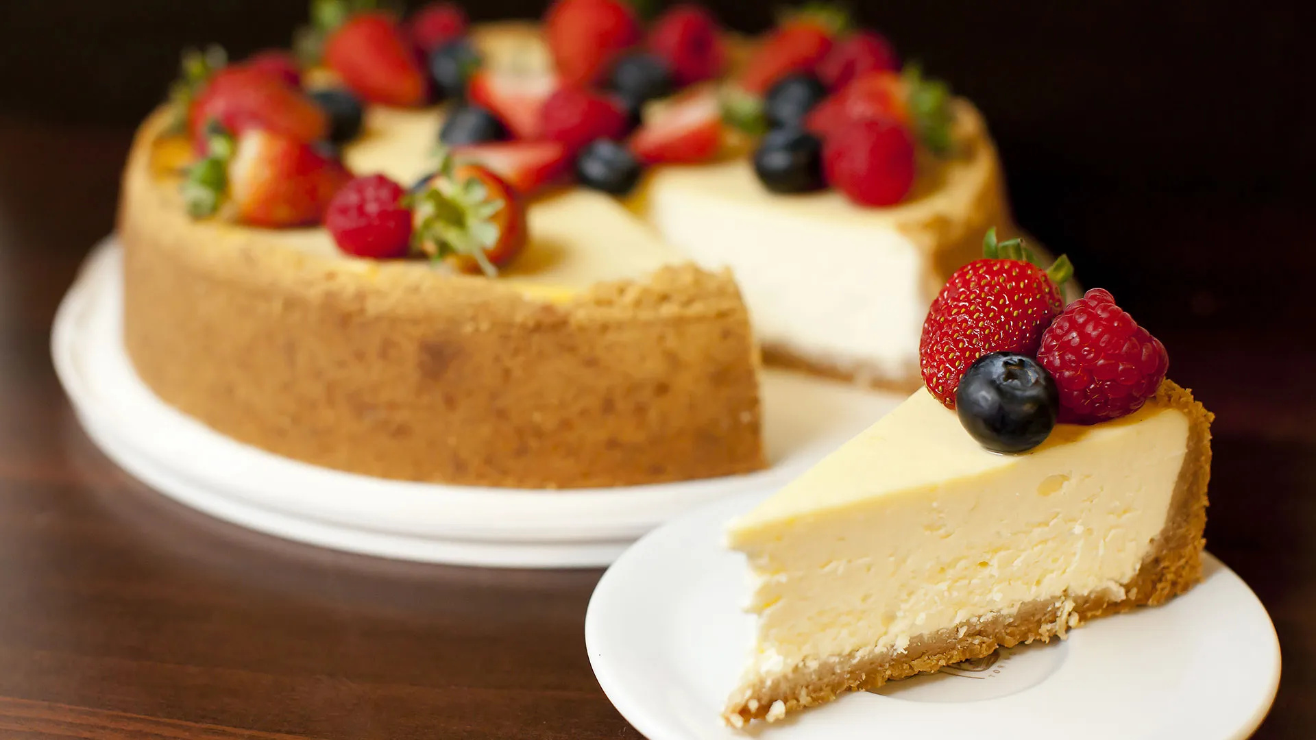 Cheesecake: Chilled and eaten cold, Strawberry, Blueberry. 1920x1080 Full HD Wallpaper.