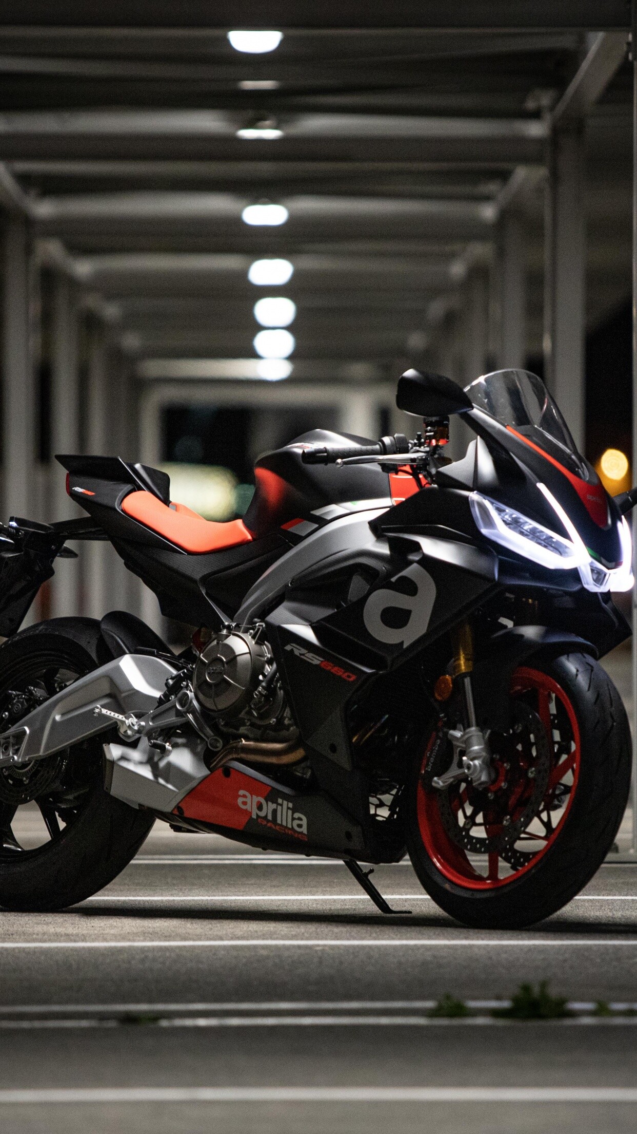 Aprilia: The brand has won a total of 54 world titles in motorcycle racing, RS 660, Sports bikes. 1250x2210 HD Background.