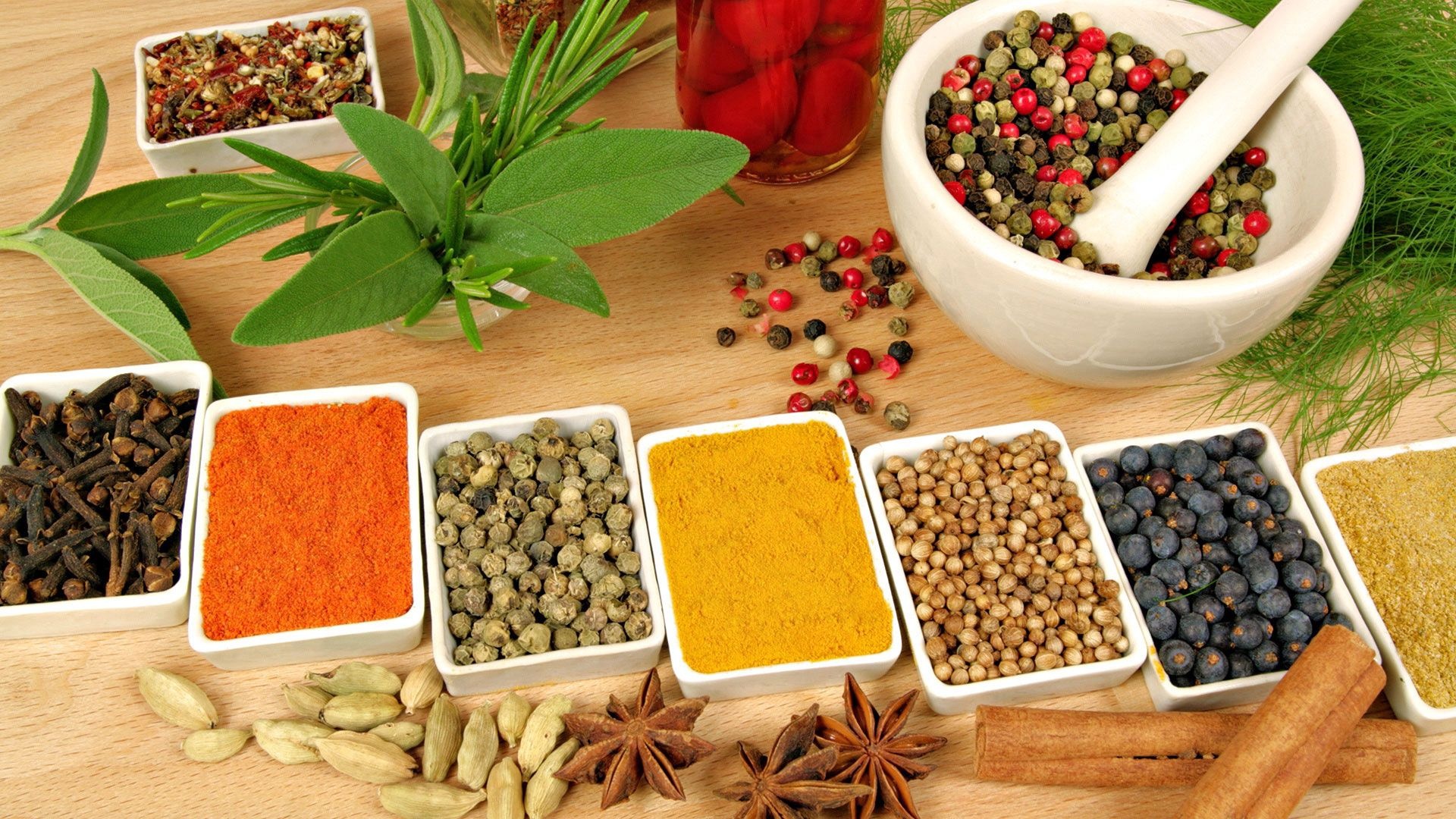 Spices: Assorted seasoning, Cloves, Cinnamon, Powerful flavors and aromas. 1920x1080 Full HD Background.