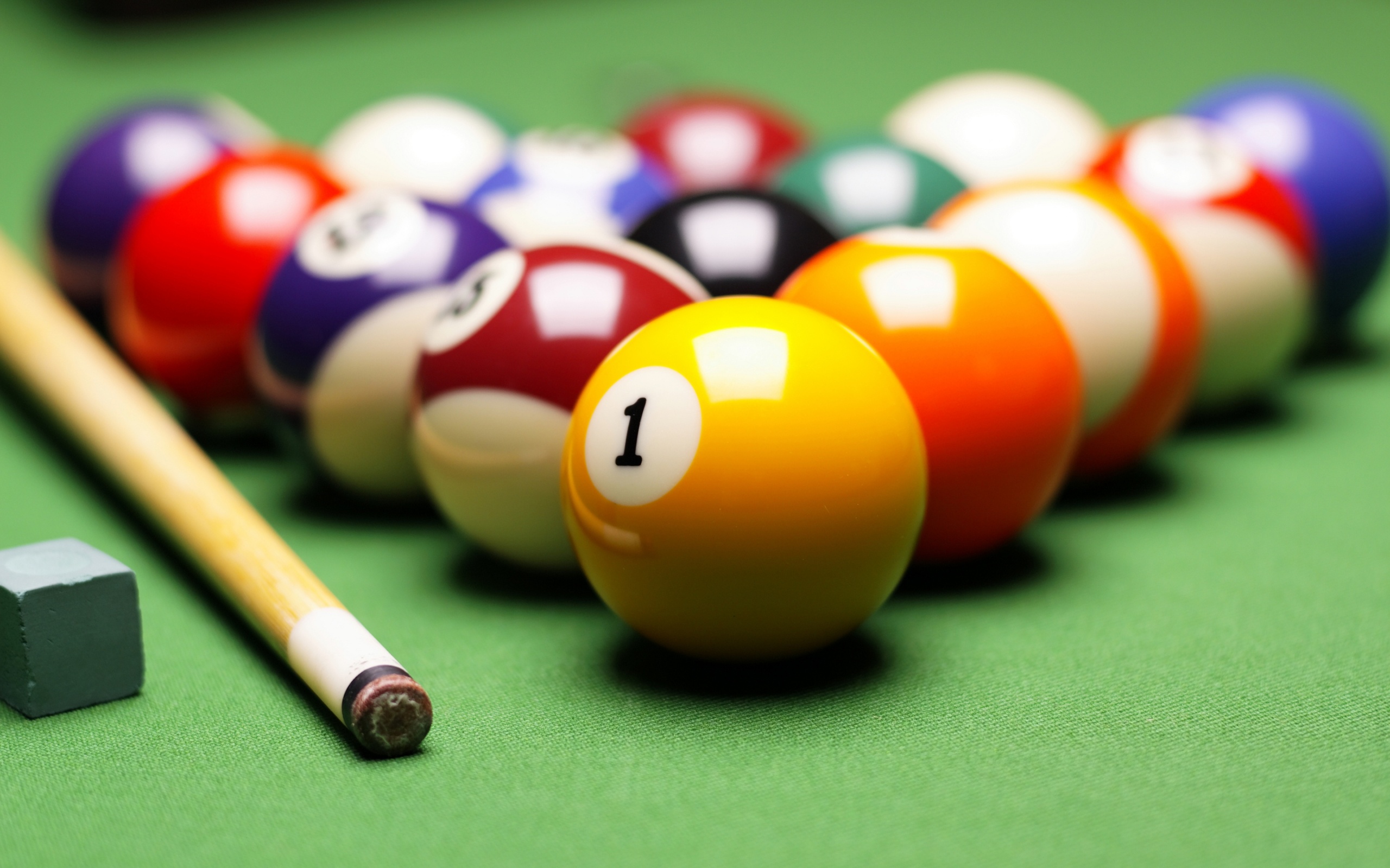 Billiards: Classic eight-ball, Seven solid-colored balls, seven striped balls, and the black 8 ball, Cue stick. 2560x1600 HD Wallpaper.