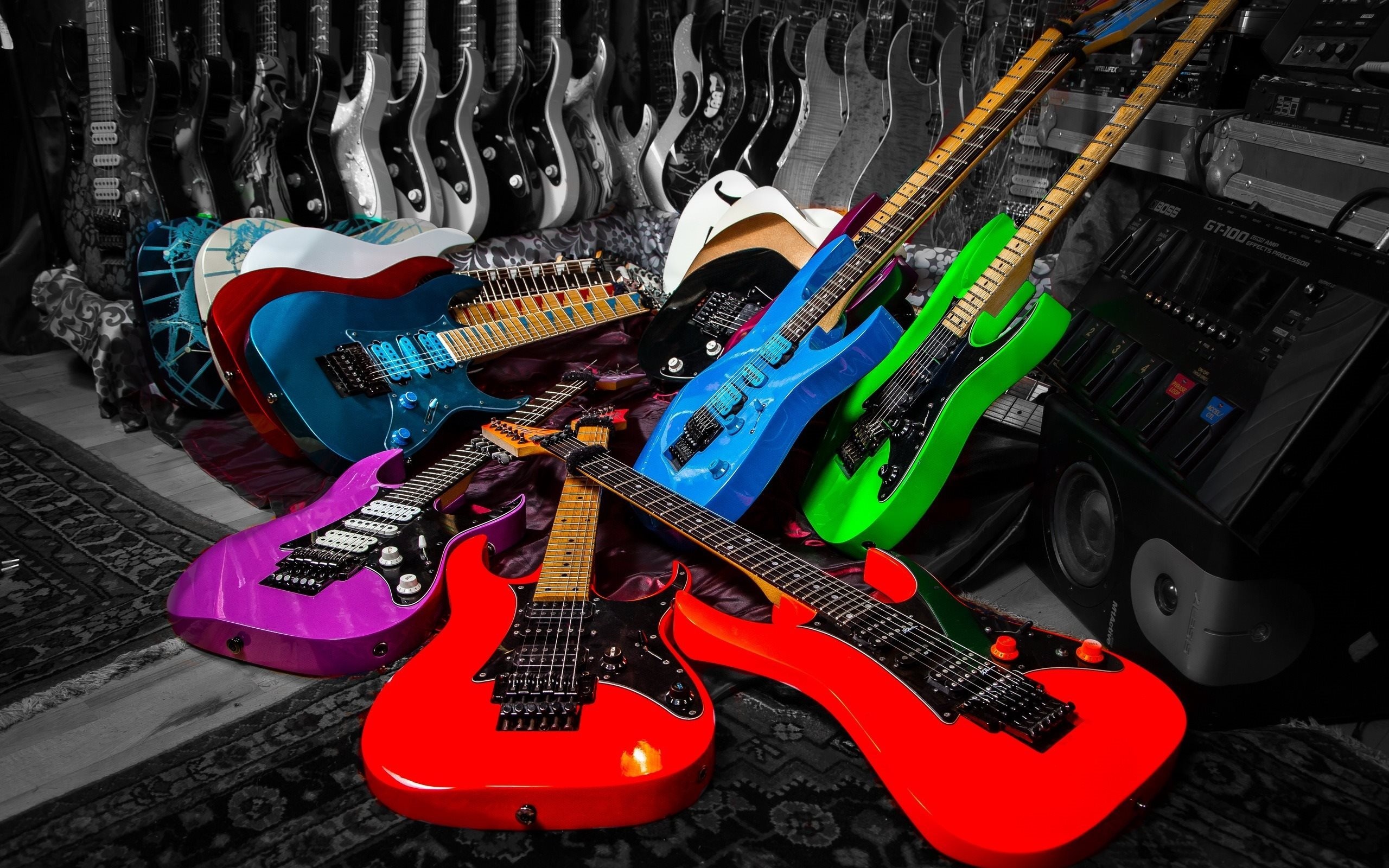 Musical Instruments: Colorful electric guitars, Solid-body instruments, The headstock, The metal machine heads. 2560x1600 HD Wallpaper.