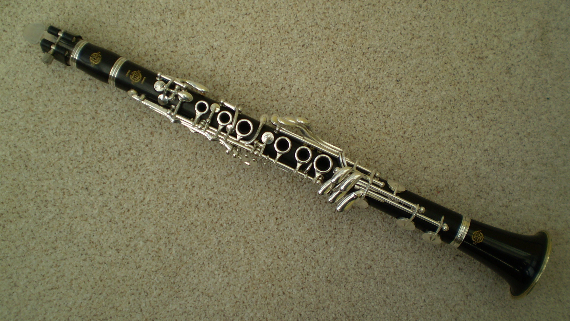 Clarinet: The musical woodwind instrument, Construction of five parts: Mouthpiece, Barrel, Upper joint, Lower joint, Bell. 1920x1080 Full HD Wallpaper.