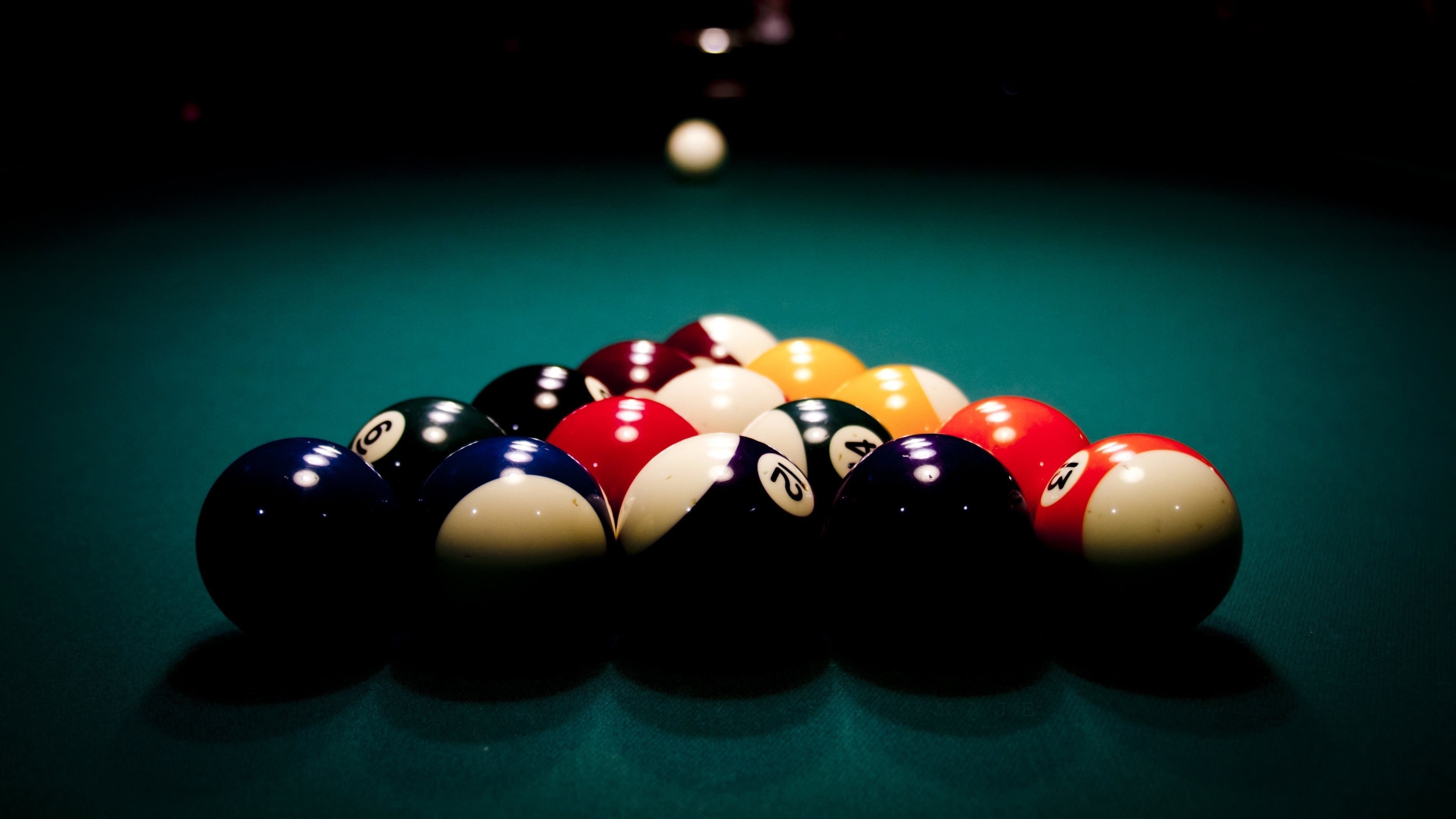 Pool (Cue Sports): A competitive and recreational sport played on a table with six pockets along the rails, into which balls are deposited. 3840x2160 4K Wallpaper.
