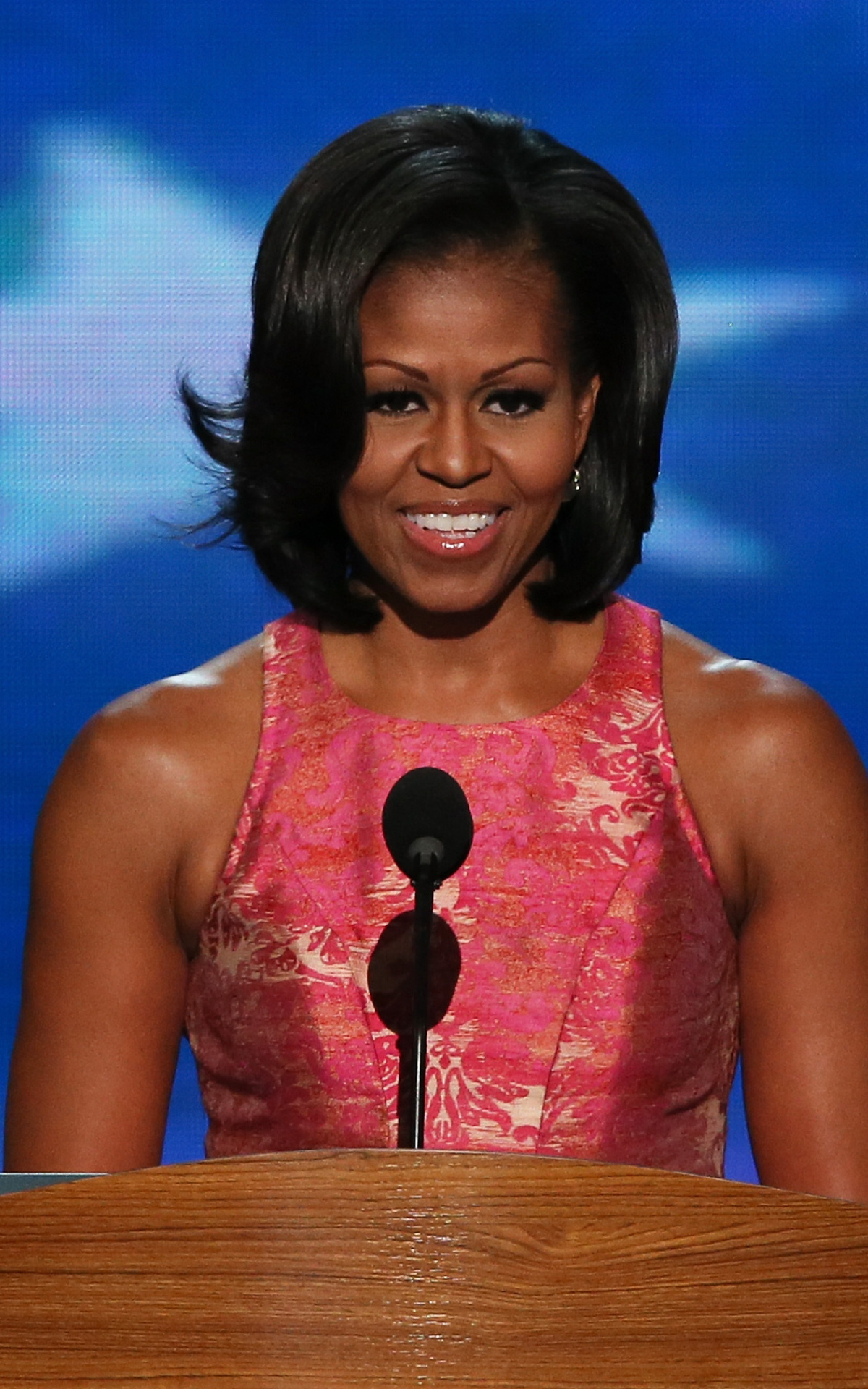 Michelle Obama: Prior to her role as first lady, she was a lawyer, Chicago city administrator and community-outreach worker. 1200x1920 HD Wallpaper.