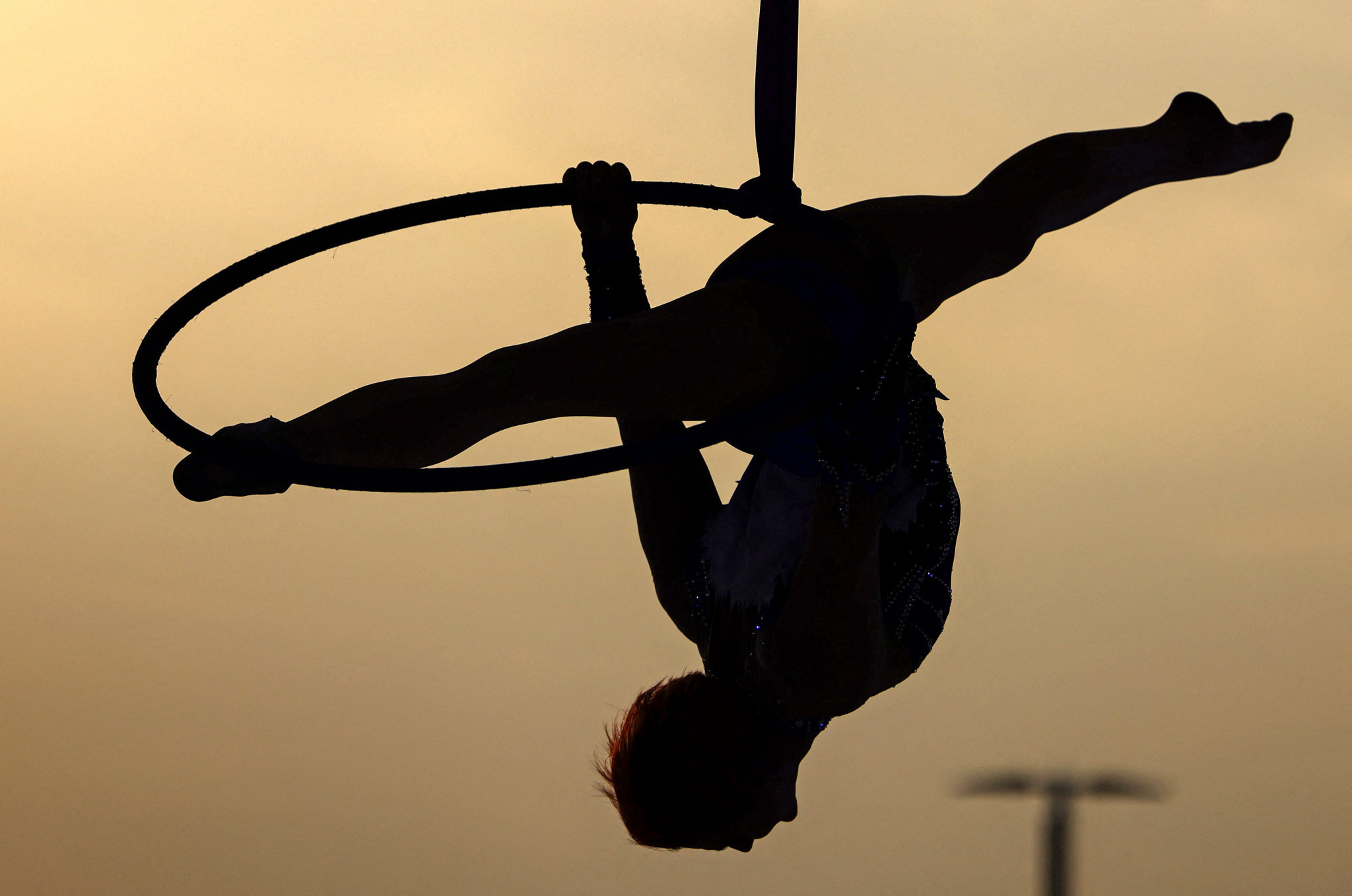 Aerial Silks: A hoop in the air event at the Rhythmic Gymnastics World Cup in Athens. 2050x1360 HD Background.