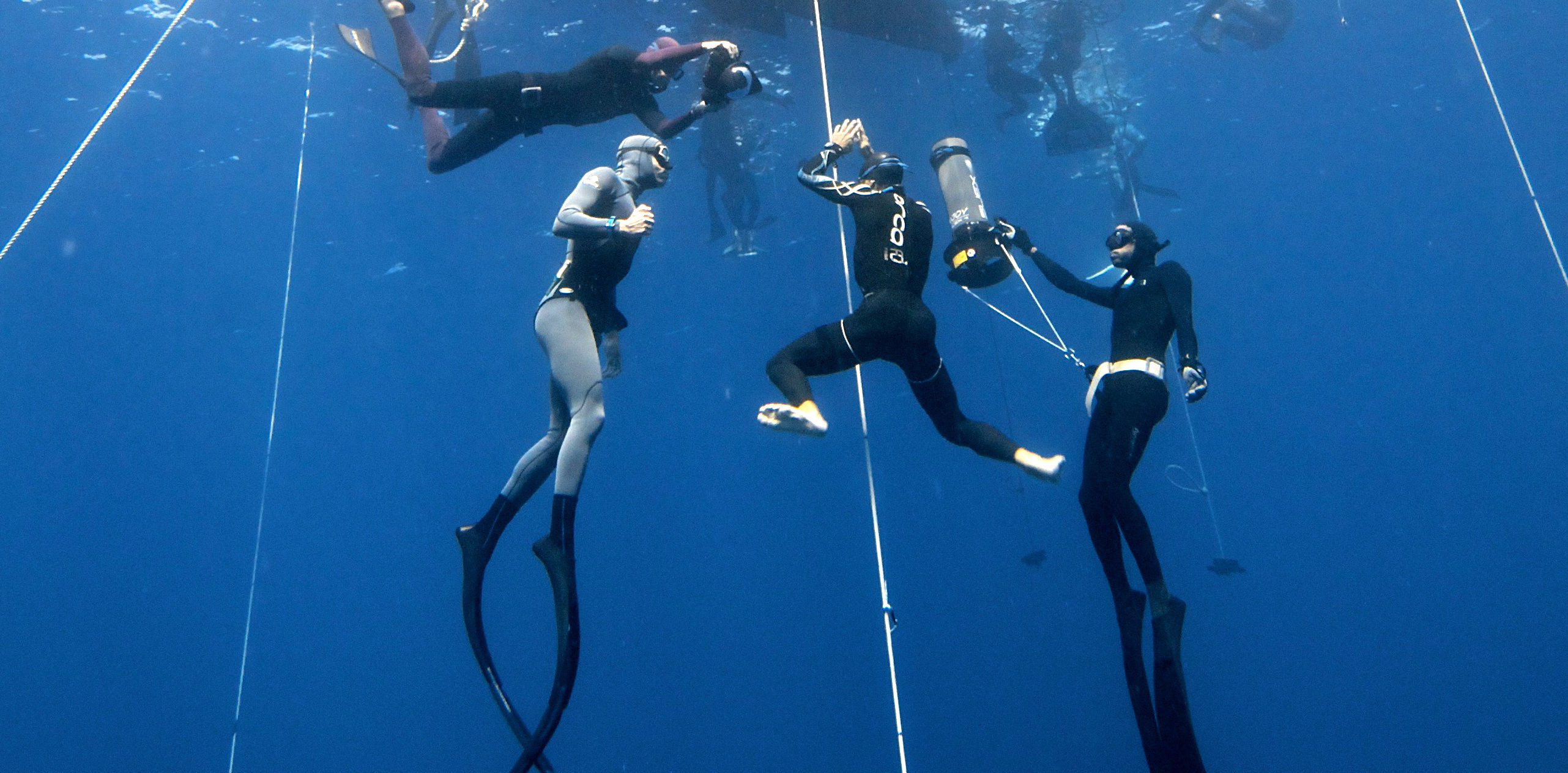 Freediving: Recreational breath-hold diving with cameras, Adventure and exploration. 2570x1270 Dual Screen Wallpaper.