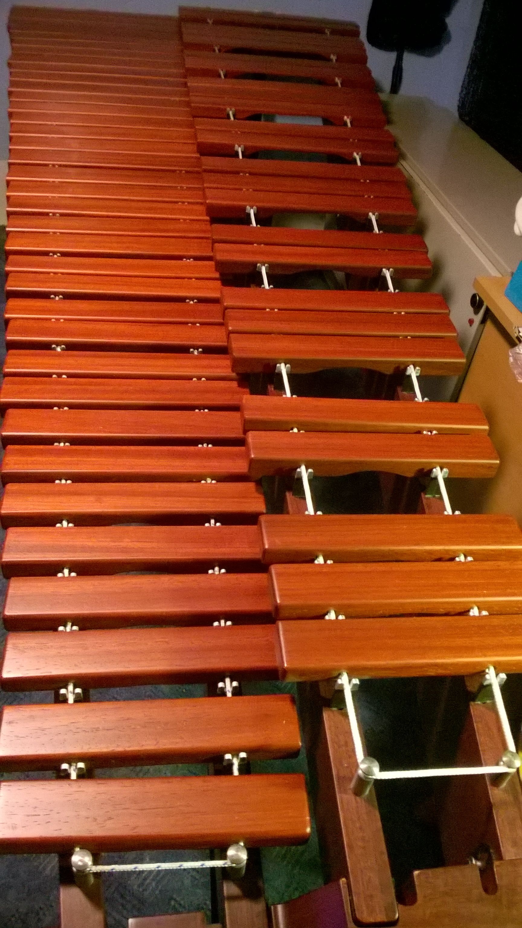 Xylophone: Marimba, Polished Hardwood, Resonator Pipes, Idiophone. 1730x3080 HD Background.