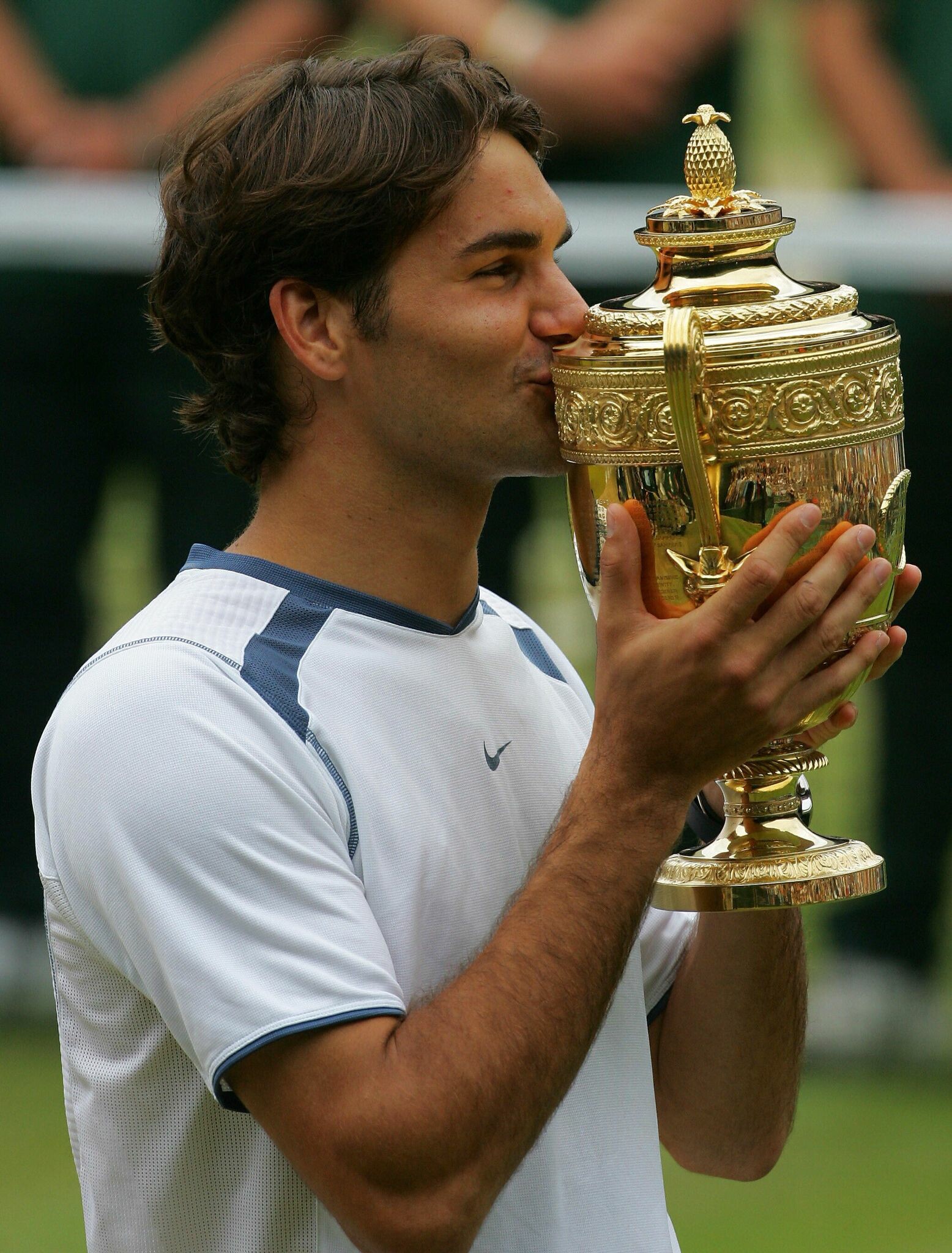 Roger Federer: He won his first Grand Slam singles title at Wimbledon in 2003. 1560x2050 HD Wallpaper.