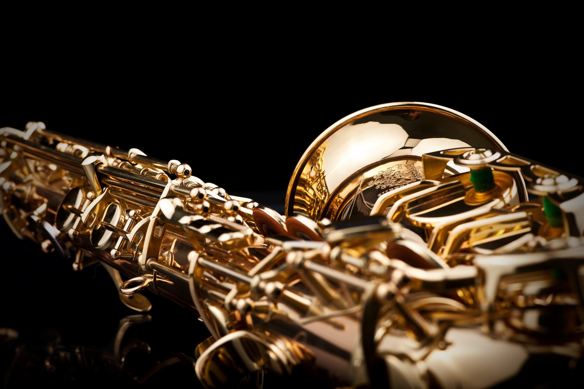Saxophone: Schagerl Woodwind, A musical instrument in the shape of a curved metal tube. 2050x1370 HD Background.