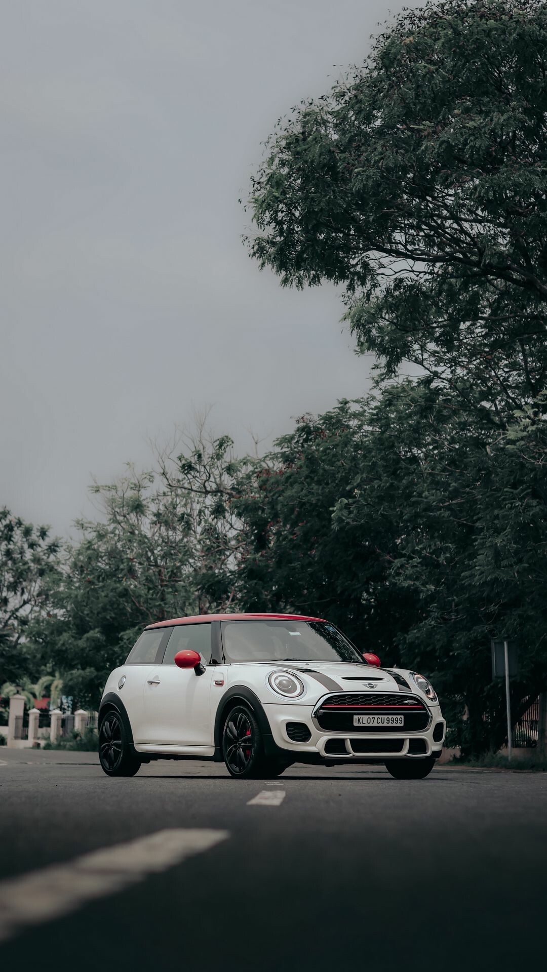 MINI Cooper: Originally, a line of British small cars manufactured by the British Motor Corporation. 1080x1920 Full HD Background.