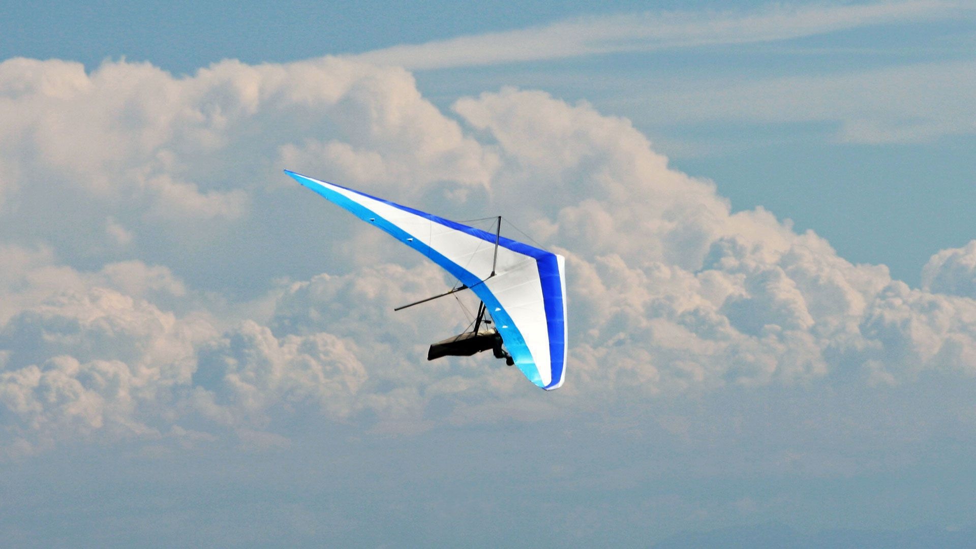Gliding: Operated foot-launched hang glider in the air, High altitude, Extreme sport. 1920x1080 Full HD Wallpaper.