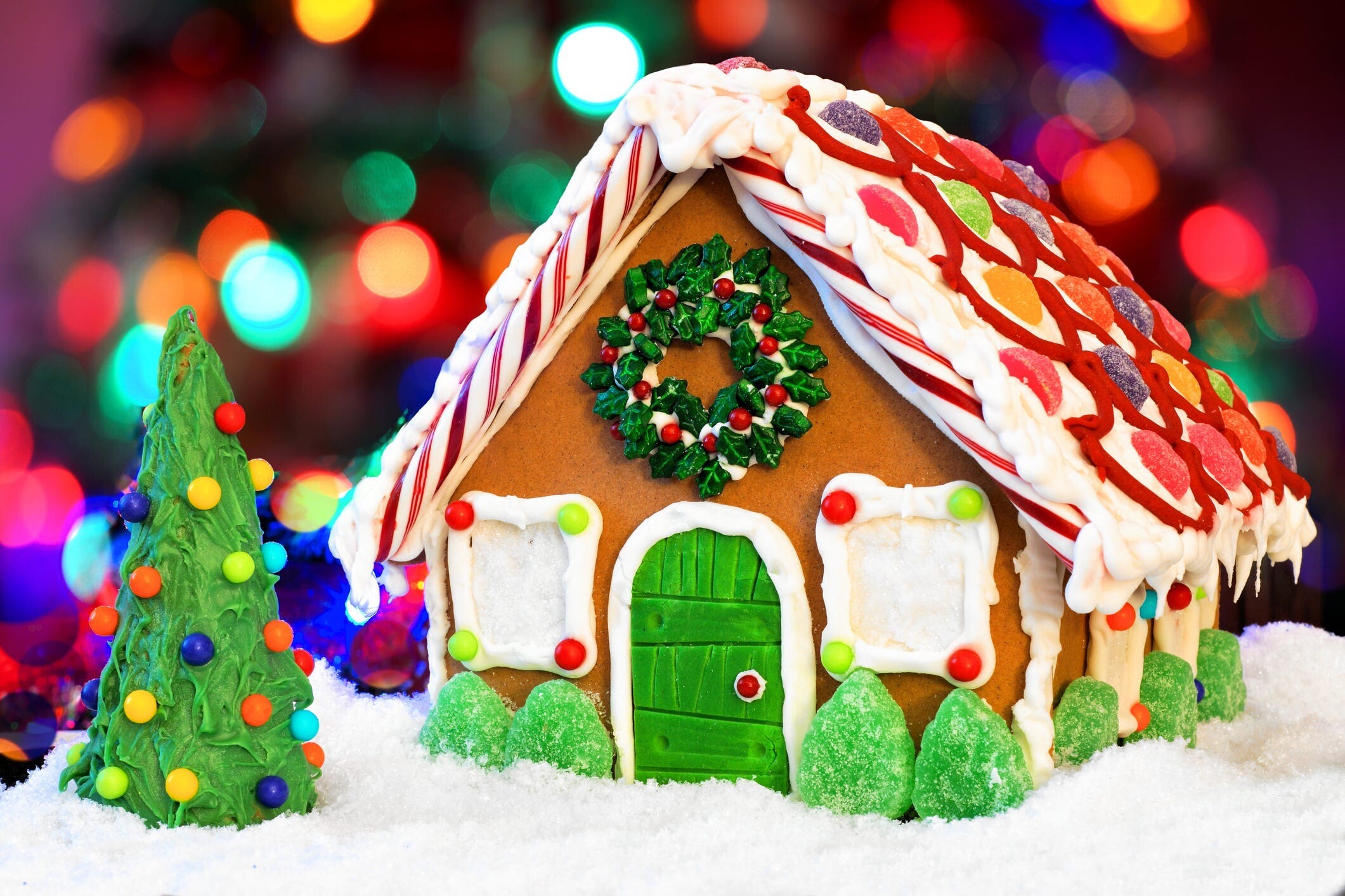 Gingerbread House: Elaborate cookie-walled houses, Gingerbread Christmas tree ornaments, Icing decorations. 2130x1420 HD Wallpaper.