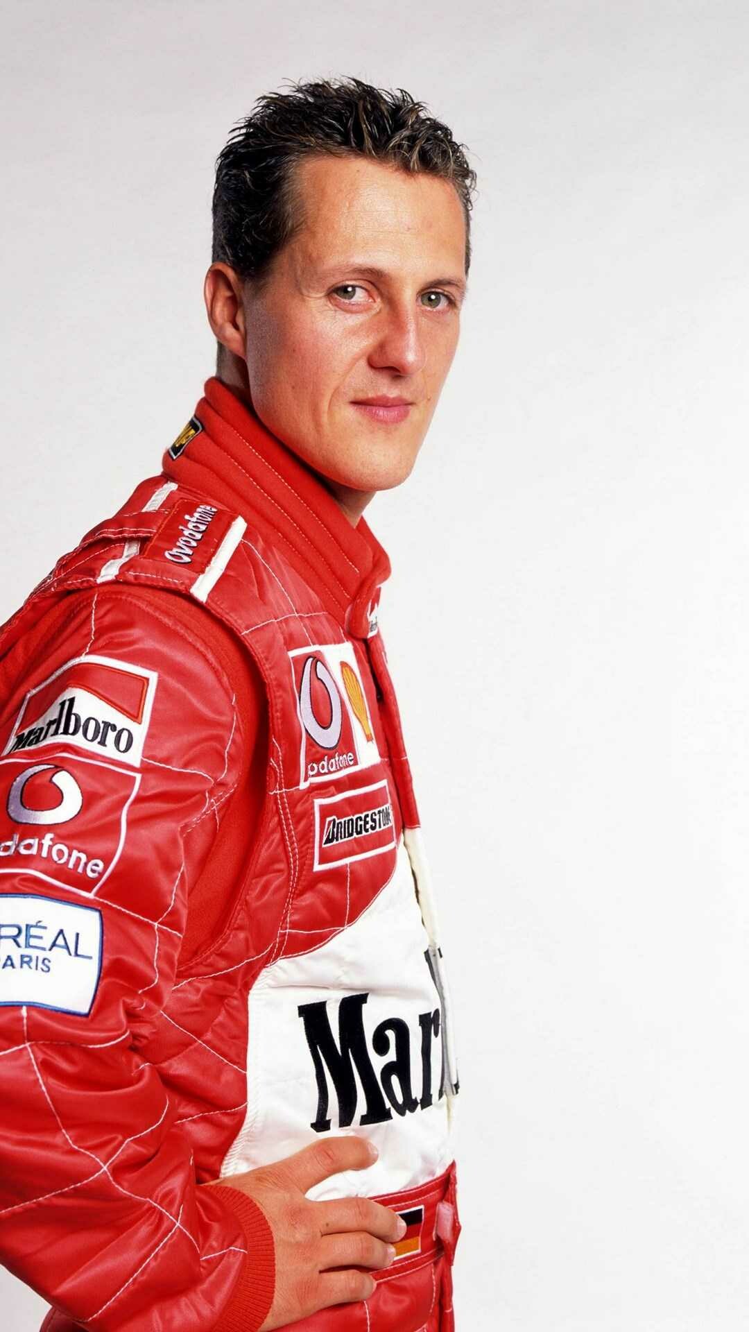 Michael Schumacher: He competed with Jacques Villeneuve for the Formula One title in 1997. 1080x1920 Full HD Background.