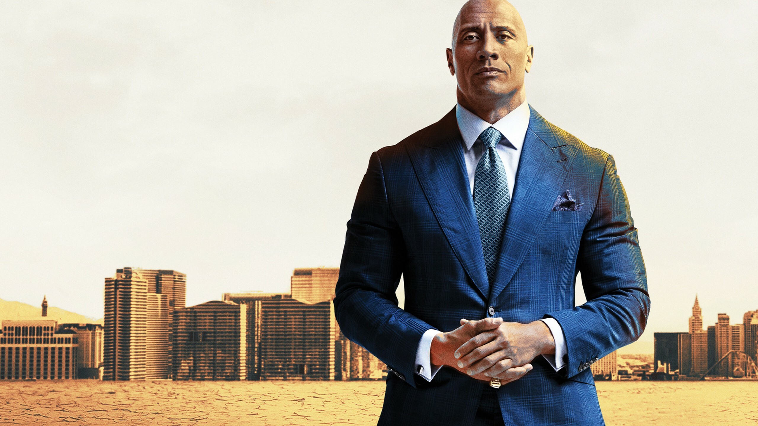 Dwayne Johnson: Produced and starred in the HBO comedy-drama series Ballers (2015–2019). 2560x1440 HD Background.