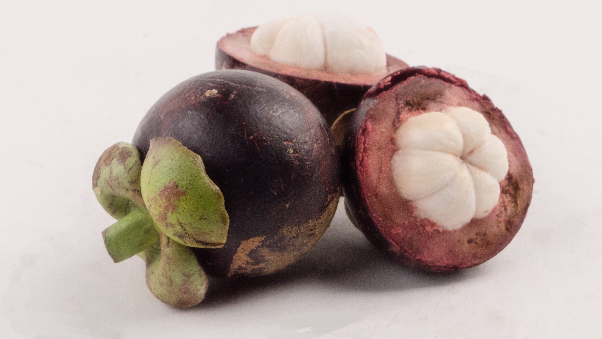 Mangosteen: National fruit of Thailand, Juicy, white flesh inside is highly prized. 1920x1080 Full HD Wallpaper.