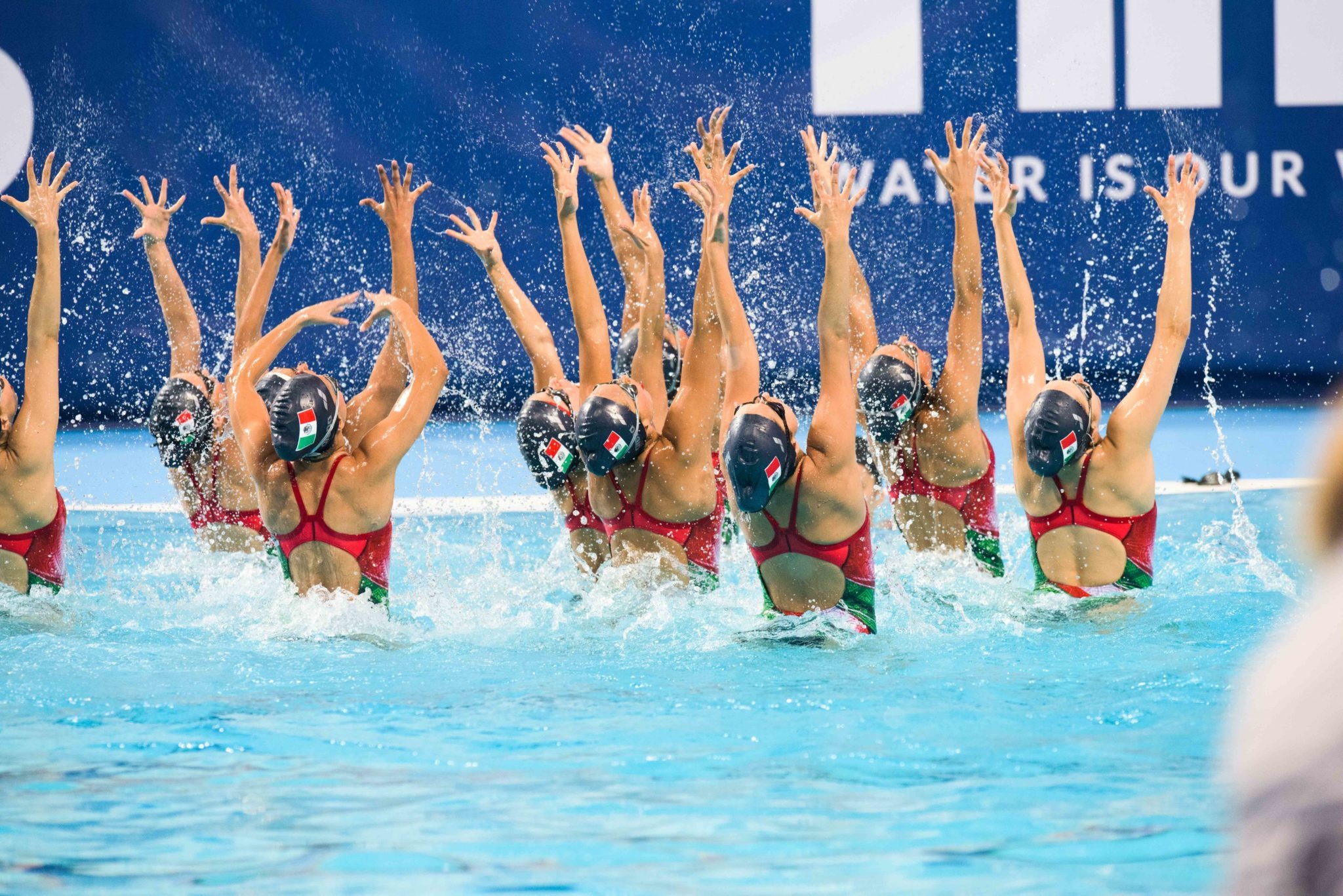 Synchronized Swimming: A group performance at the Champions Cup, A competitive water sports discipline. 2050x1370 HD Wallpaper.