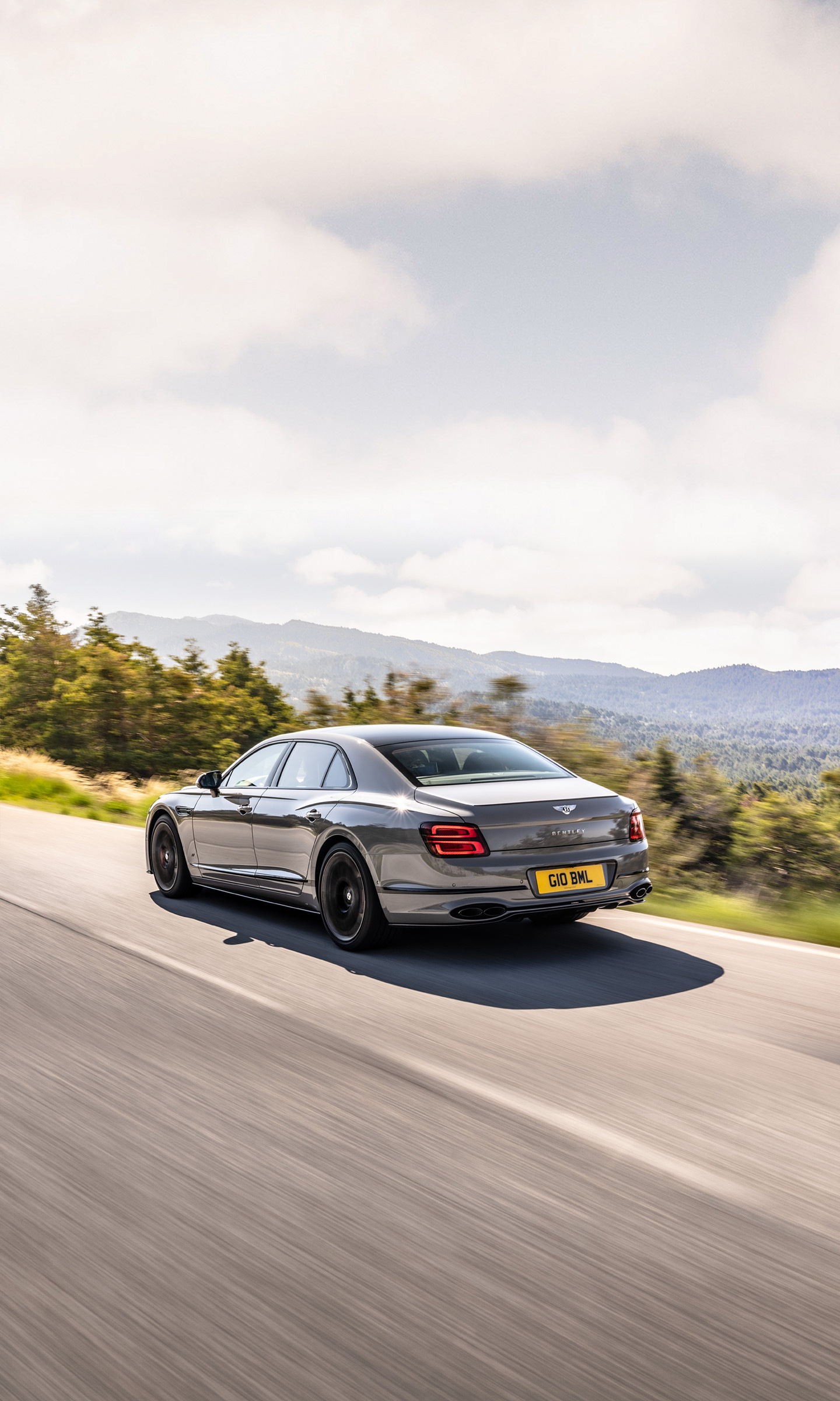Bentley Flying Spur, Sleek rear allure, Three-quarter view beauty, Motortread wallpapers, 1440x2400 HD Phone