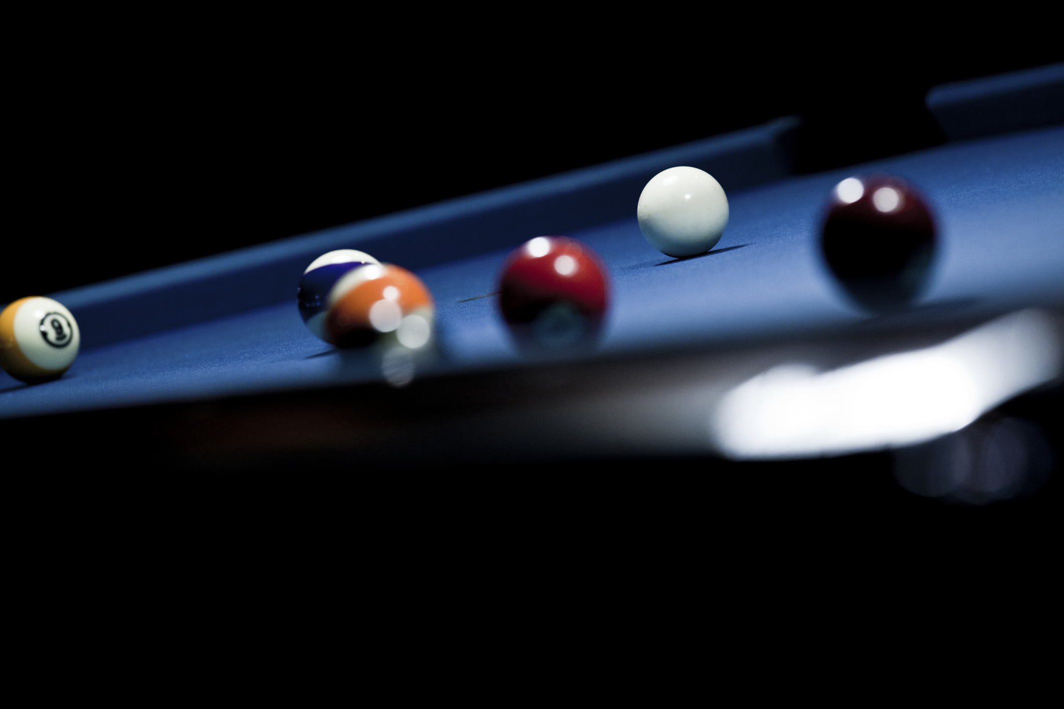 Pool (Cue Sports): Retro-style eight-ball object balls on a billiard table covered with blue baize. 2130x1420 HD Background.